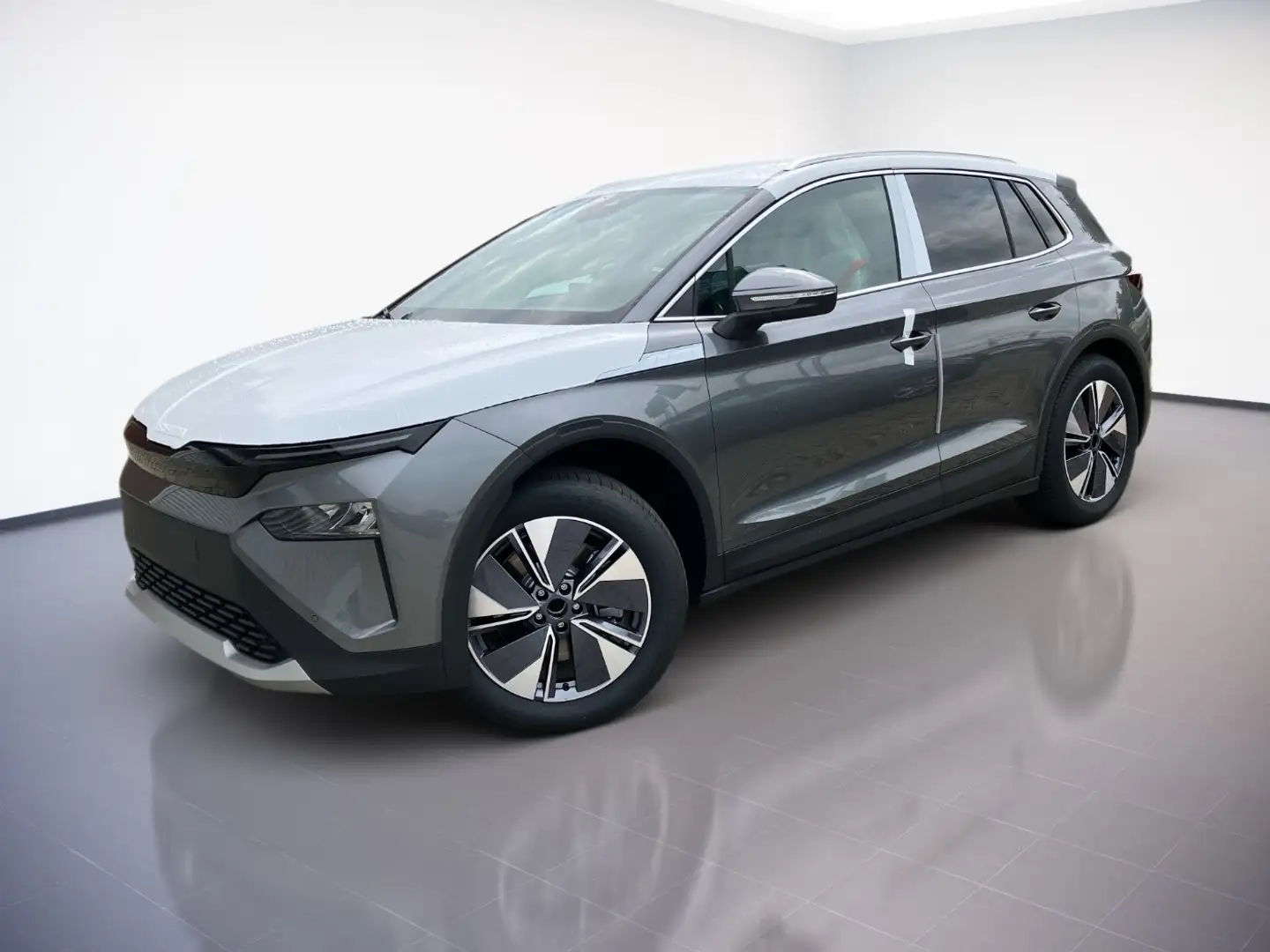 Skoda Elroq 85 LightA.NAVI.TravelA.WÄRMEPUMPE.KAM.AHK.AMBIENTE Grijs - 1