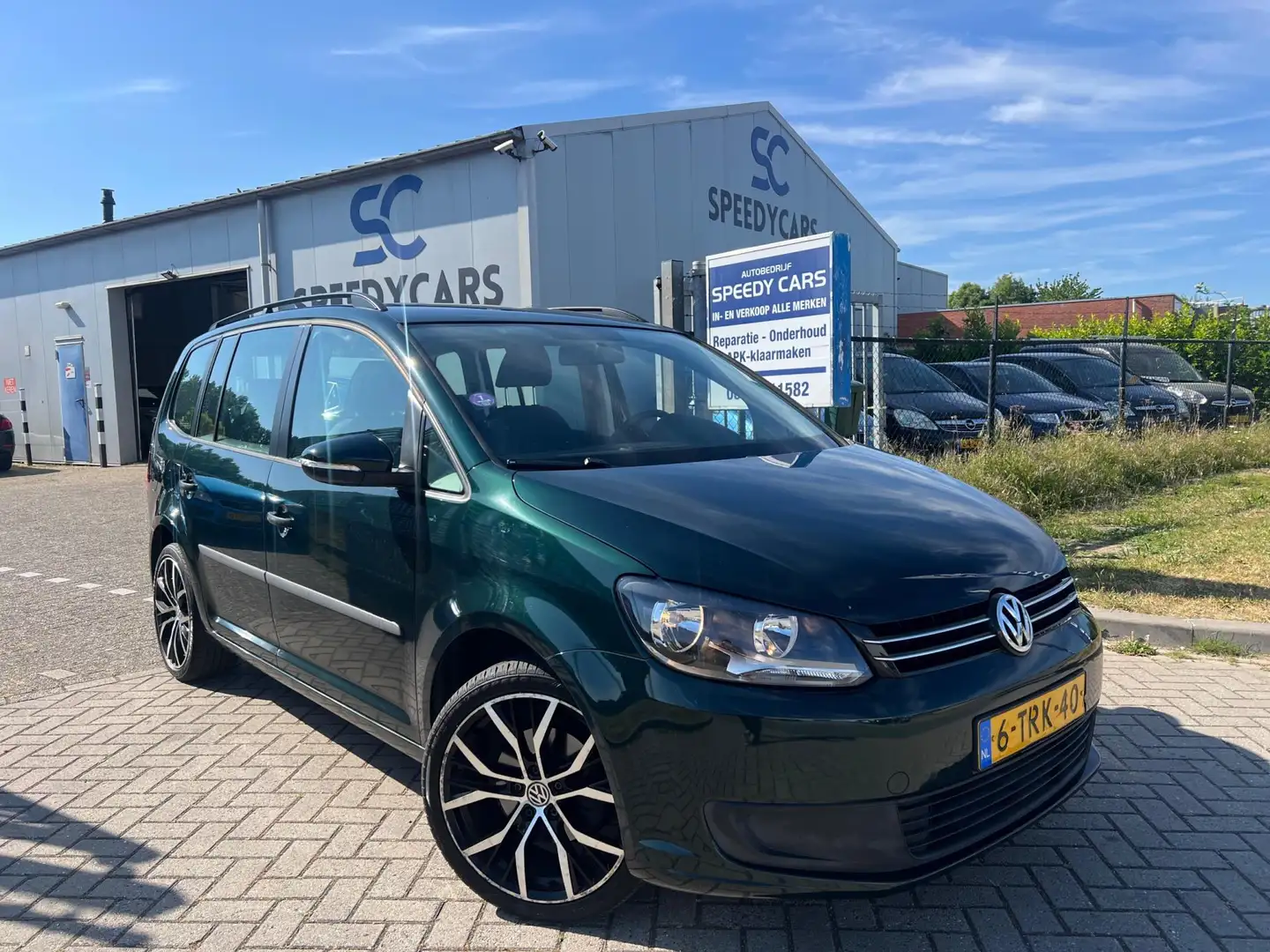 Volkswagen Touran 1.2 TSI Trendline Bluemotion 7p 2014 Clima Groen - 1