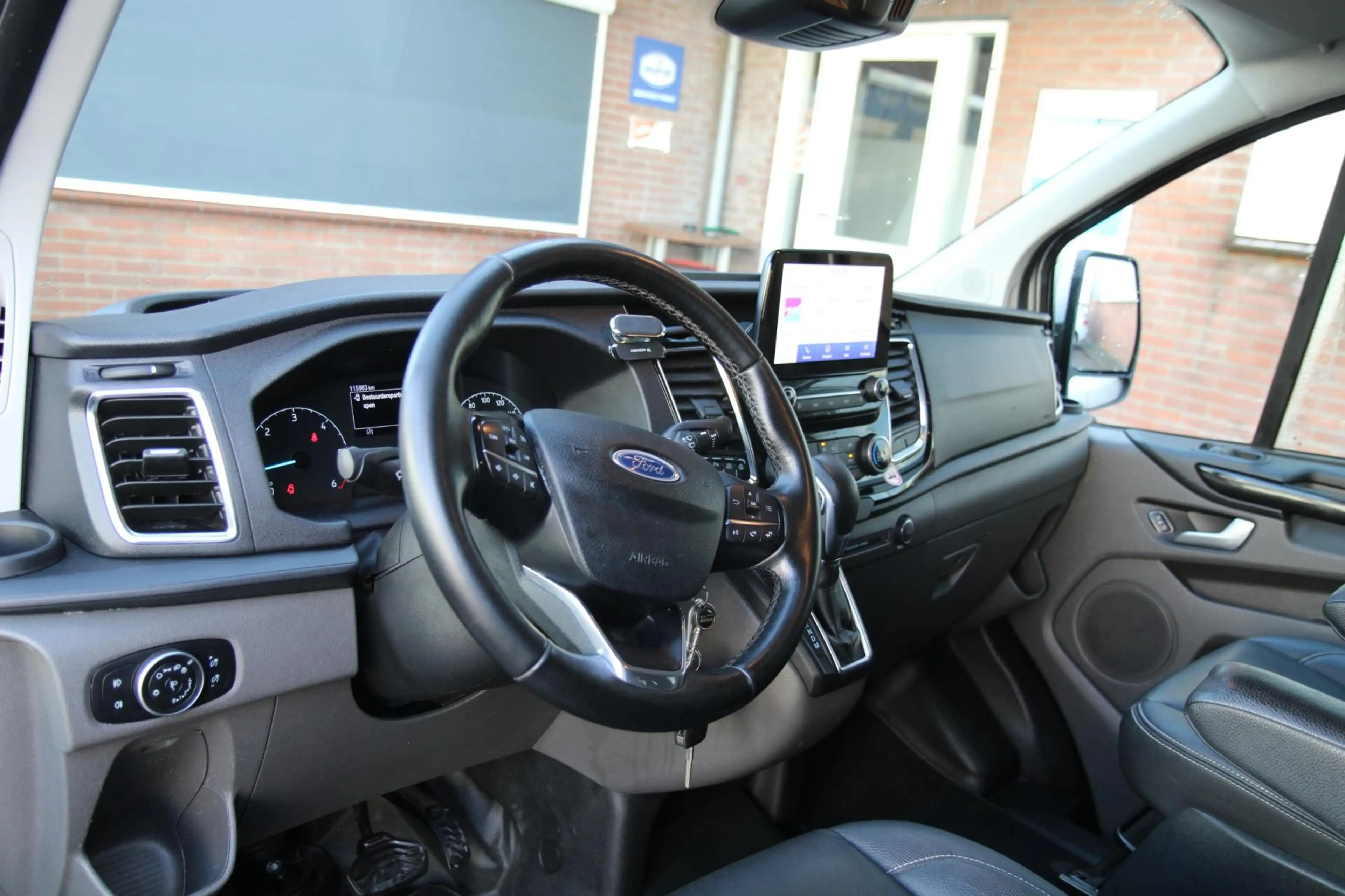 Ford Transit Custom 320 2.0 TDCI L2H1 Platinum Edition DC / Automaat 1 — photo 16