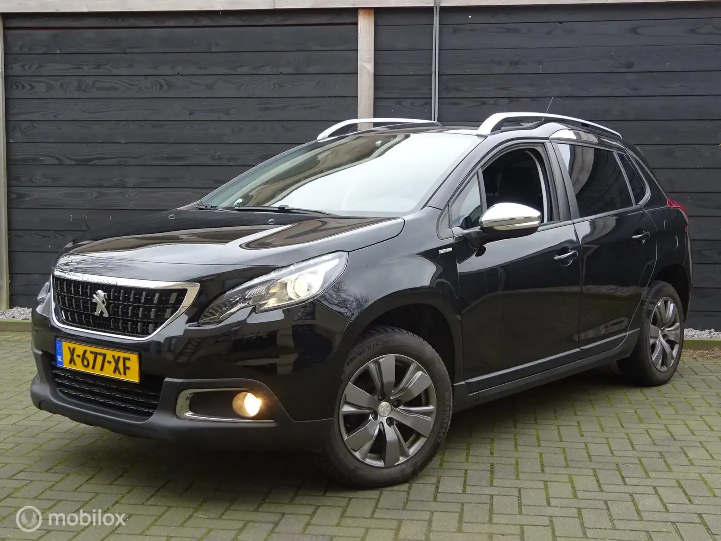 Peugeot 2008 1.2 PureTech Allure/Style FM nav / Carplay / Clima Negro - 1