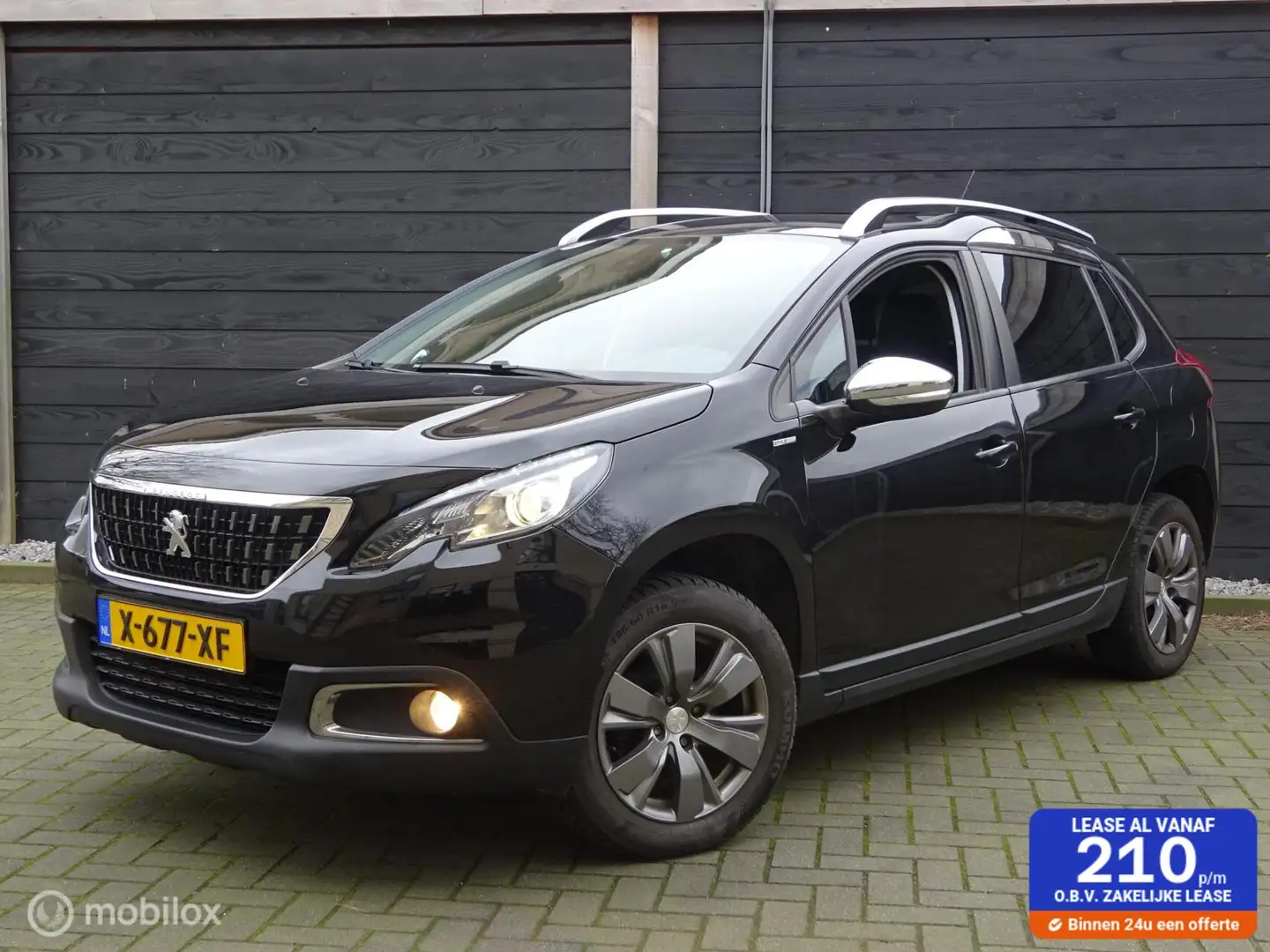 Peugeot 2008 1.2 PureTech Allure/Style FM nav / Carplay / Clima Zwart - 1