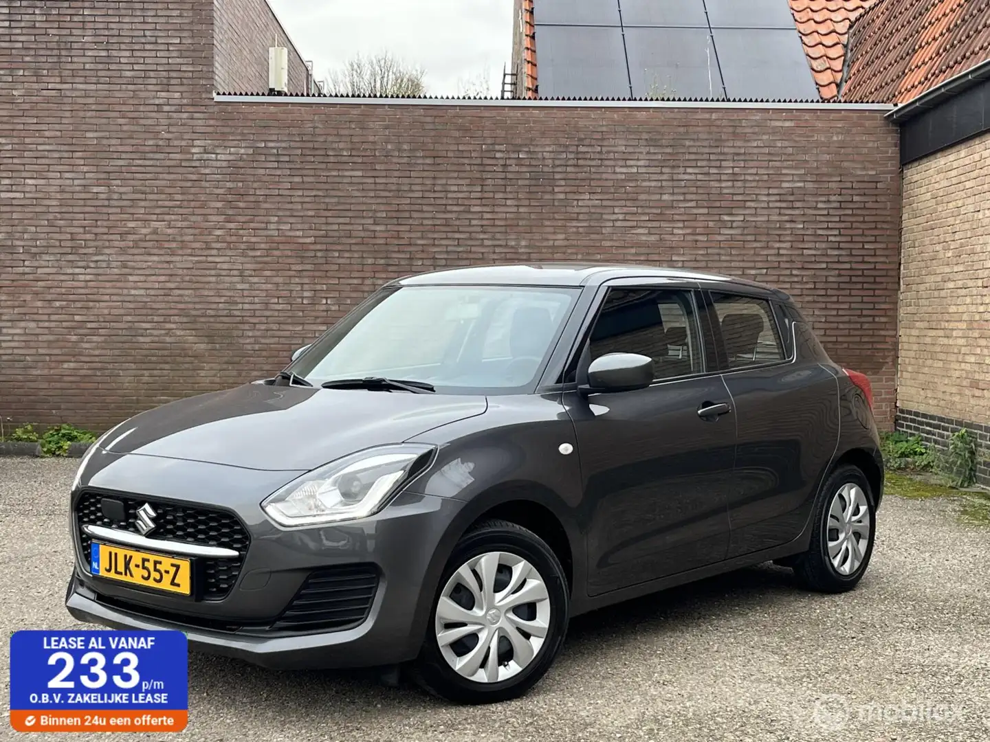 Suzuki Swift 1.2 Comfort Smart Hybrid | Rijklaar Gris - 1