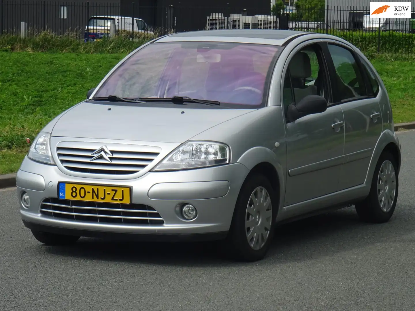 Citroen C3 1.4i Exclusive NAP/CLIMA/CRUISE/APK Grau - 1