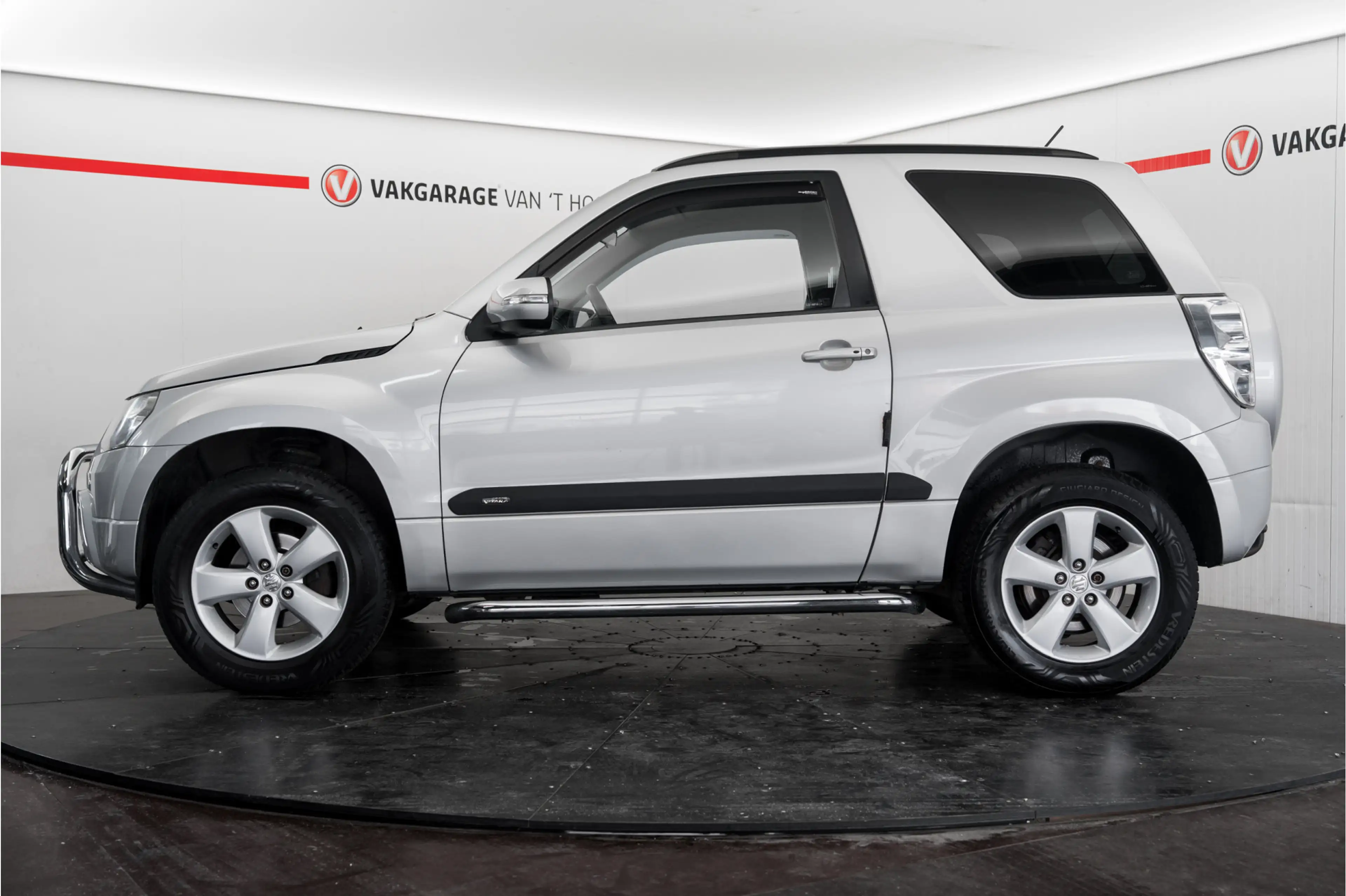 Suzuki Grand Vitara 2.4 Exclusive — photo 12