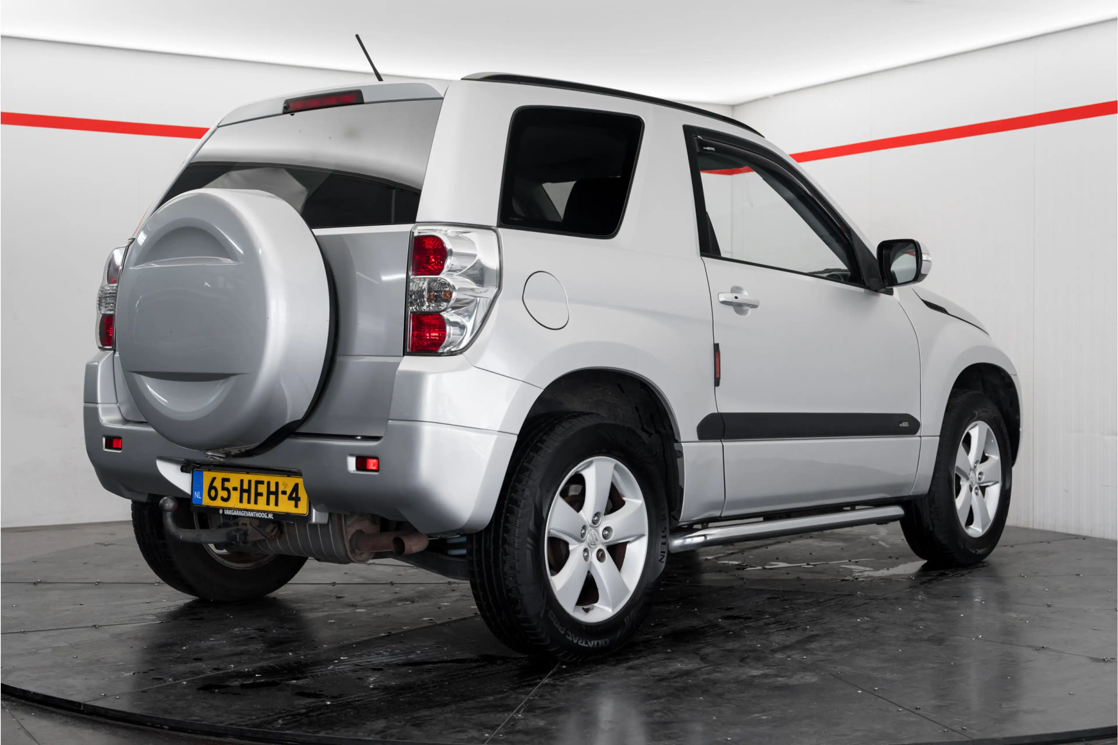 Suzuki Grand Vitara 2.4 Exclusive — photo 8