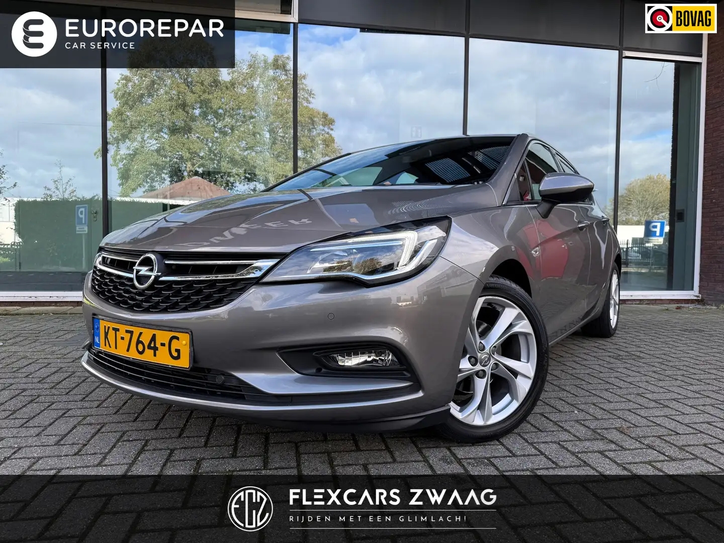 Opel Astra 1.4 Turbo - Navi - Climate - Parkeerhulp - Trekhaa Grigio - 1
