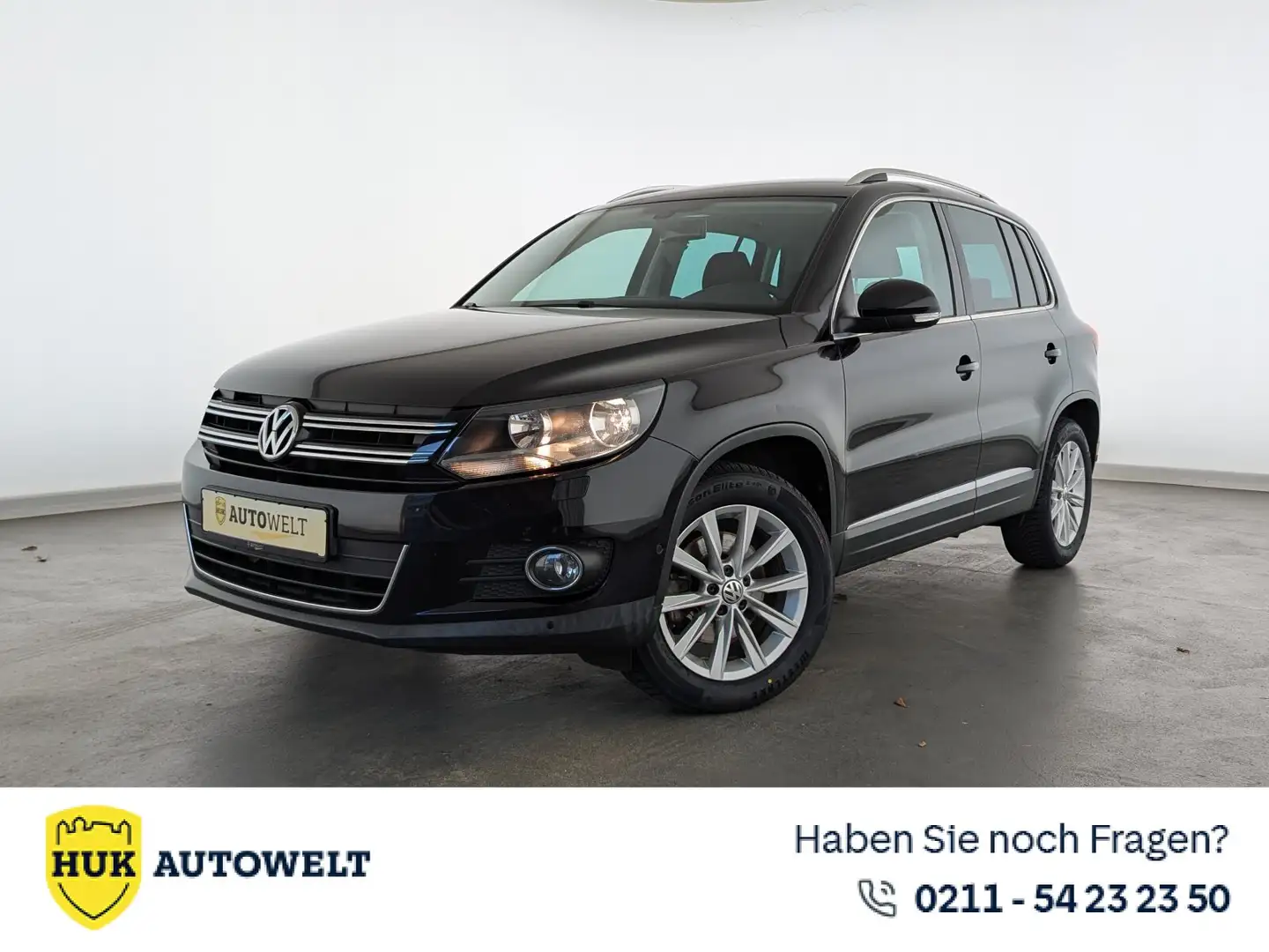 Volkswagen Tiguan Tiguan 1.4 TSI BMT Sport & Style NAVI+PDC+SHZ+ BC Schwarz - 1