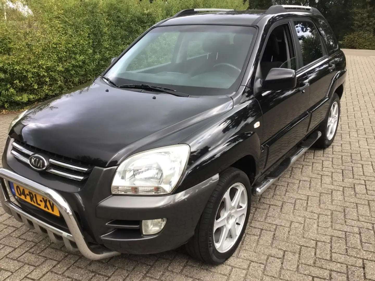 Kia Sportage 2.0 CVVT COMFORT Zwart - 1