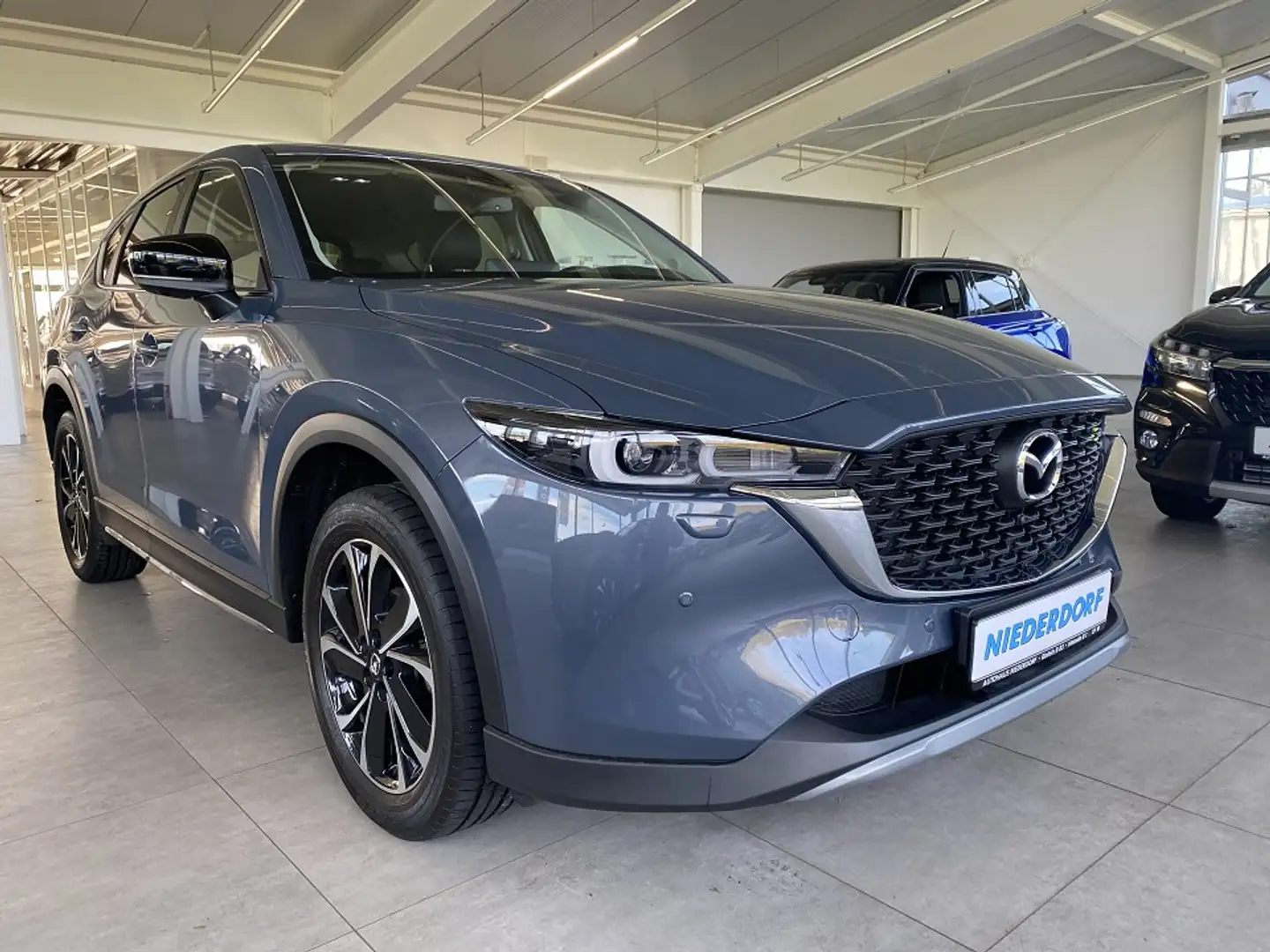 Mazda CX-5 2.5 Newground AUTOMATIK Teilleder, Navi, 19" Grau - 1