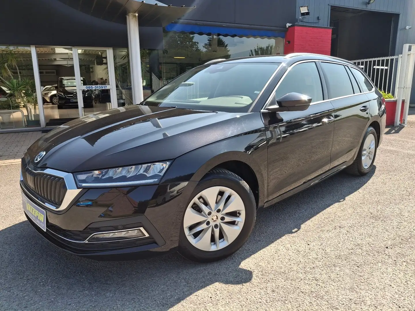 Skoda Octavia COMBI 1.0TSI 110cv 6Vit GPS/CARPLAY/APS/CAMERA/BT Noir - 1