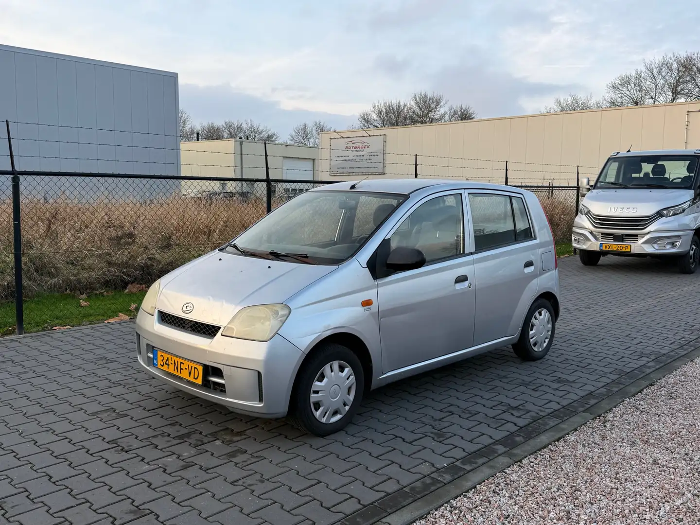 Daihatsu Cuore 1.0-12V Nagano | Automaat | 5 Deurs | Airco | Inru Gris - 2