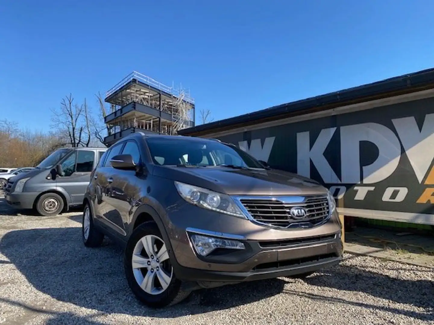 Kia Sportage 1.6i 2WD Lounge * ENKEL HANDEL/EXPORT * Marrone - 1