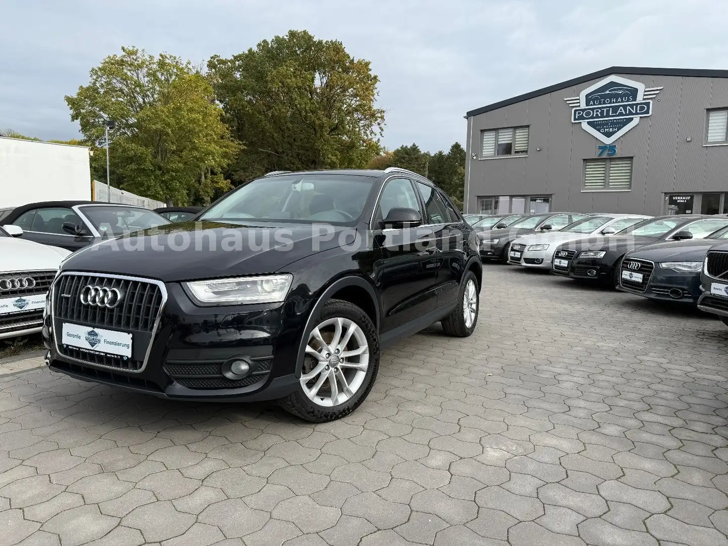 Audi Q3 2.0 TFSI quattro/S-Heft/Navi/Xenon/AMI/AHK Schwarz - 1