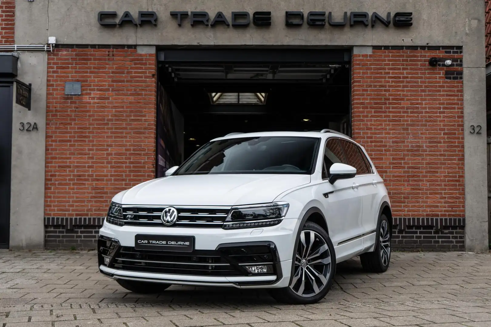 Volkswagen Tiguan 2.0 TSI 4Motion R-Line Pano / HUD / Dynaudio Wit - 1