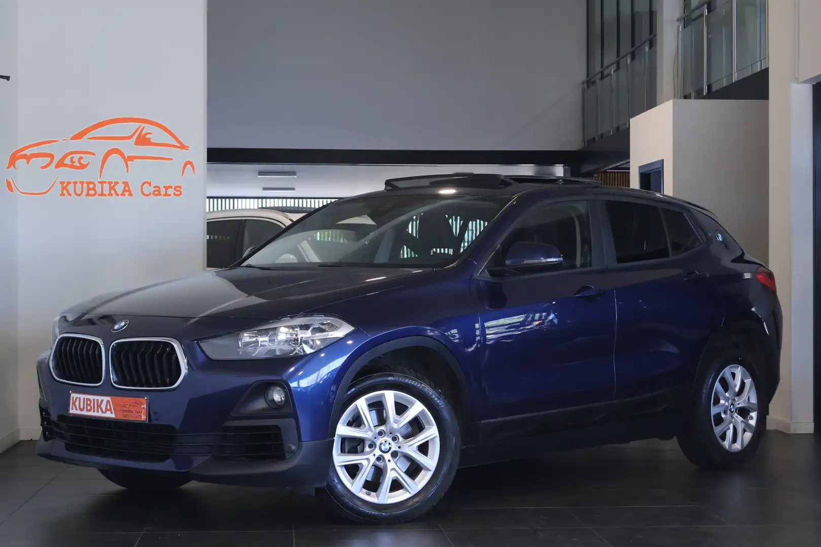 BMW X2 1.5iA sDrive18 OPF Pano Navi Airco Leder Garantie* Bleu - 1