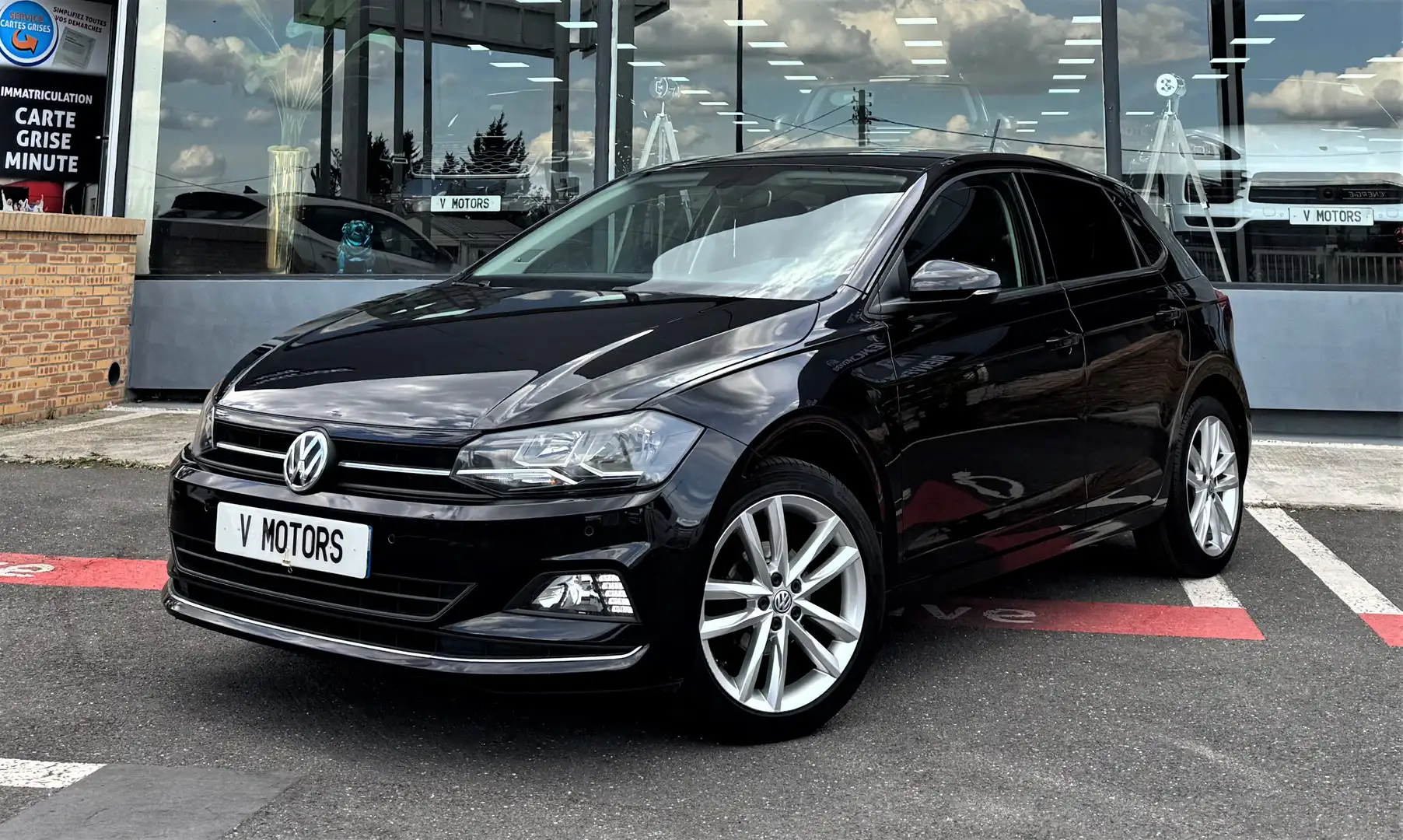 Volkswagen Polo TSI 95 Carat Highline Design' 1er Main Noir - 1