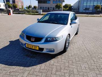2.0i Sport