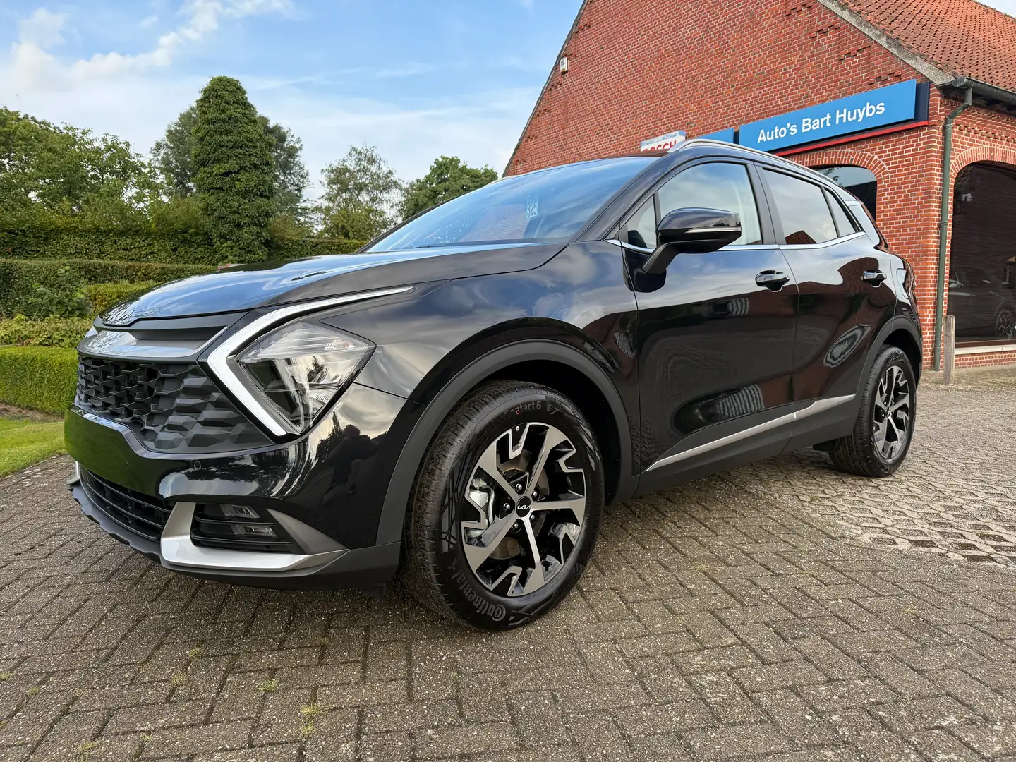 Kia Sportage PULSE 1.6 T-GDI HYBRIDE - GPS/LED/PDC/CAMERA/... Чёрный - 1