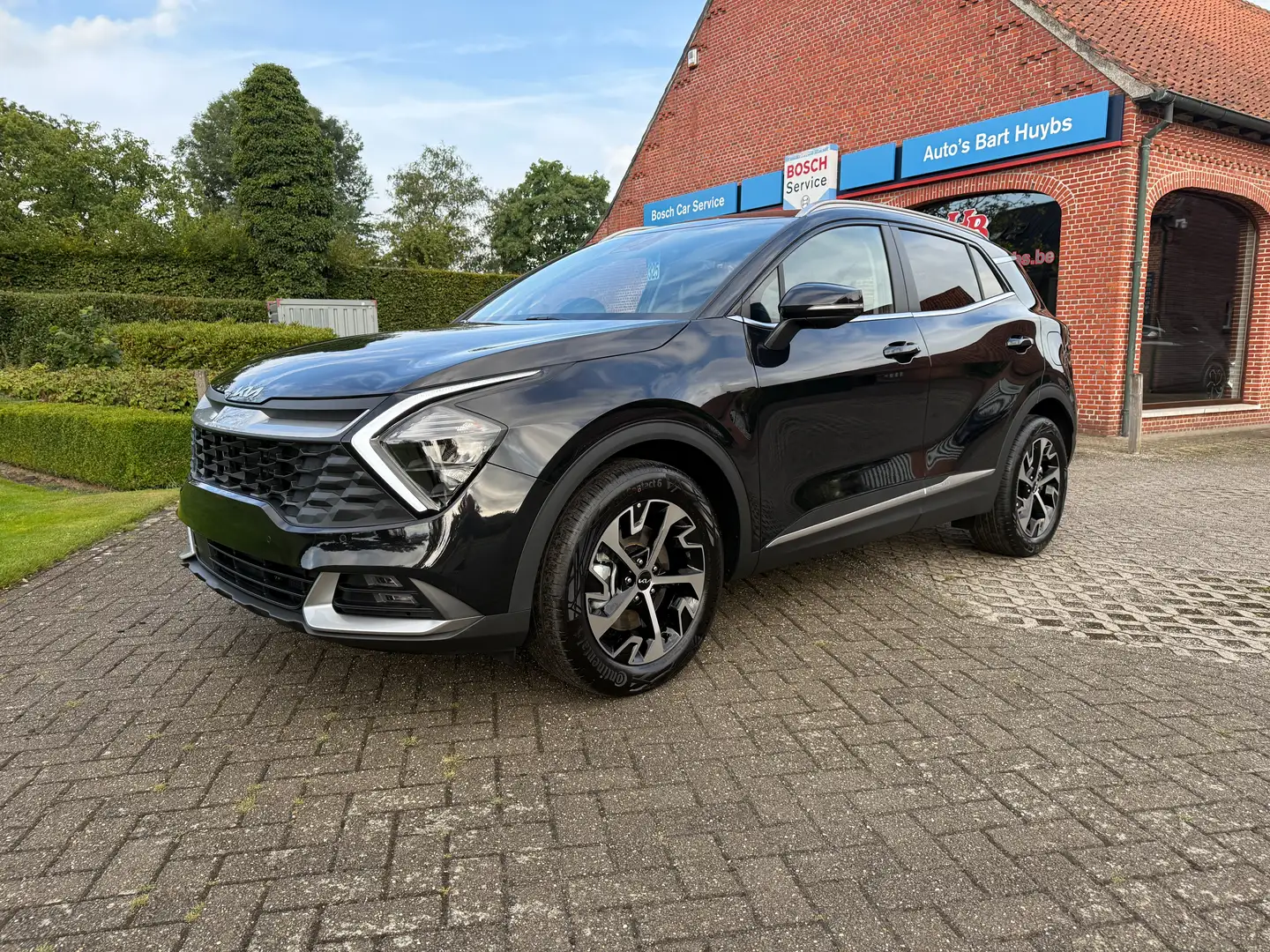 Kia Sportage PULSE 1.6 T-GDI HYBRIDE - GPS/LED/PDC/CAMERA/... Zwart - 2