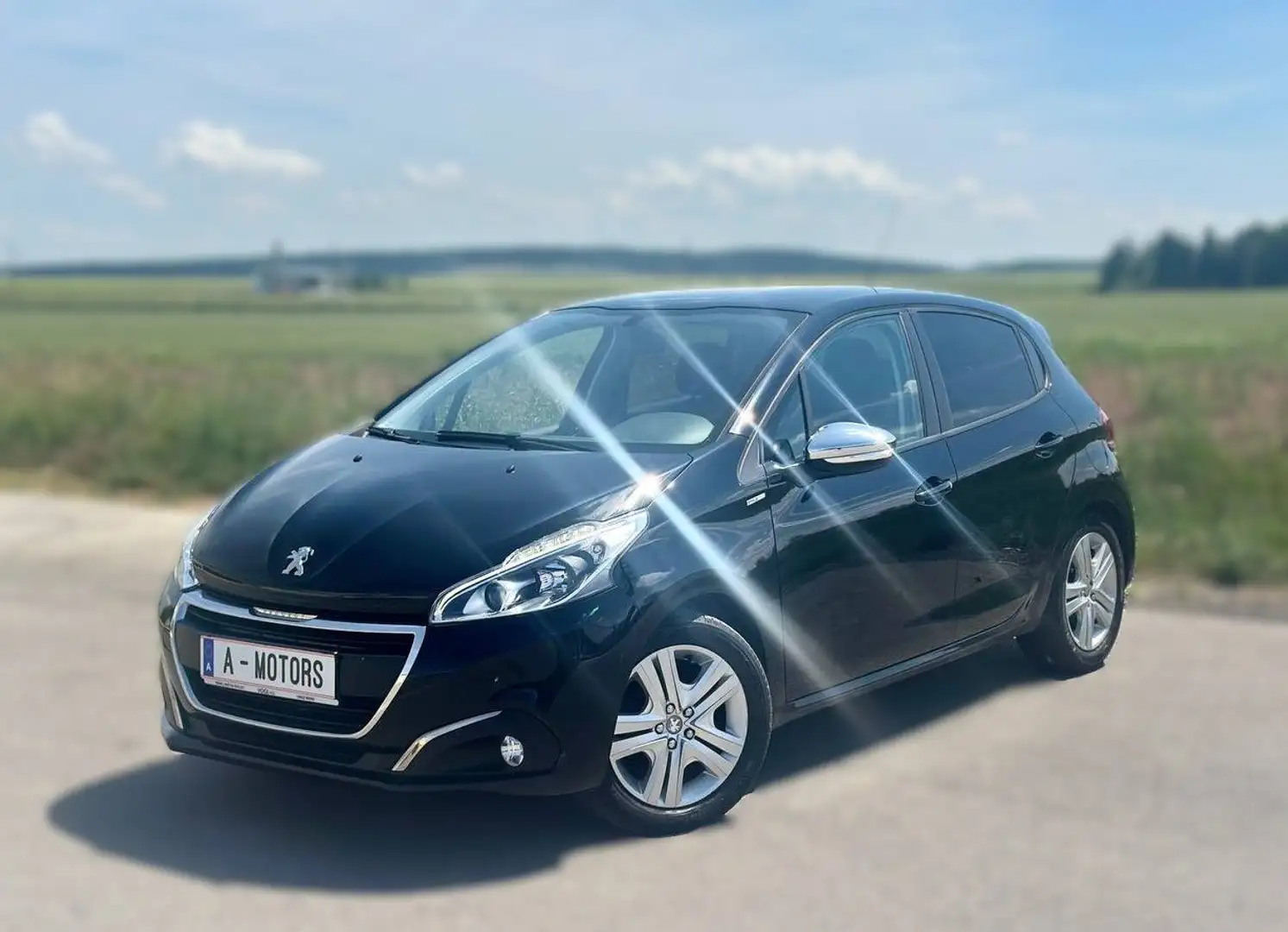 Peugeot 208 208 Style 1,2 PureTech 82 Style Schwarz - 2