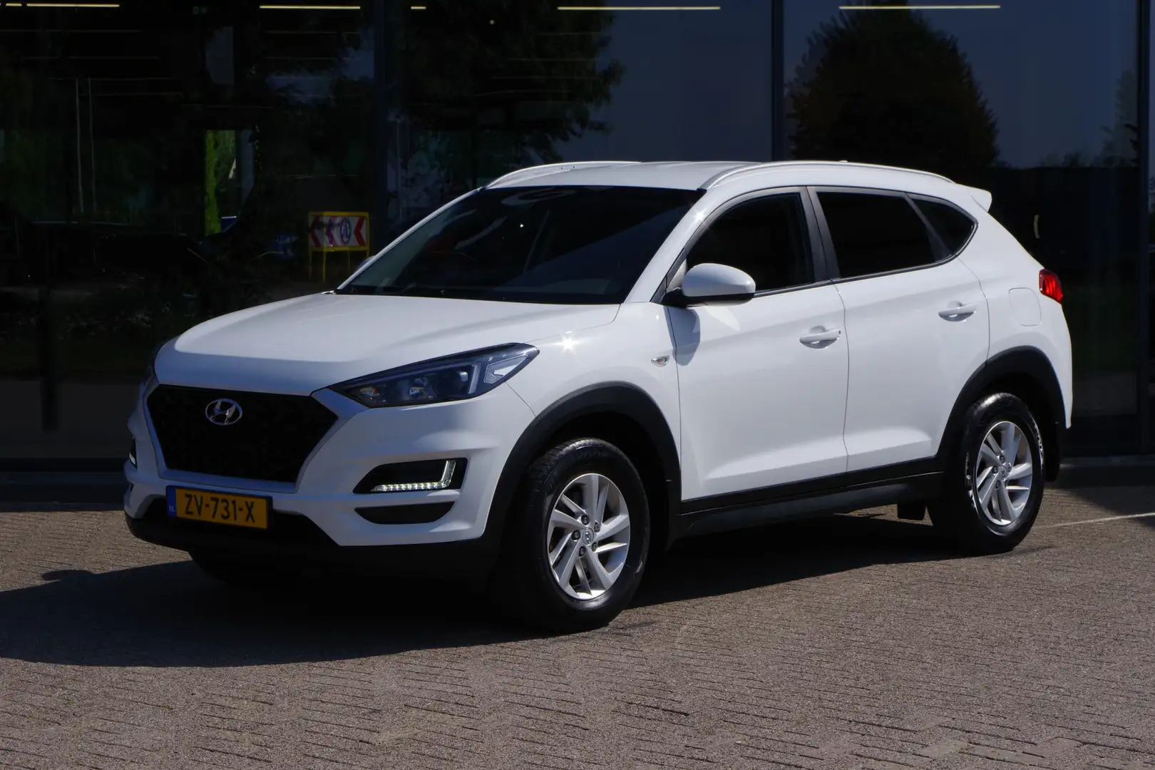 Hyundai TUCSON 1.6 132 PK GDi i-Motion, Trekhaak, Cruise Control, Weiß - 1
