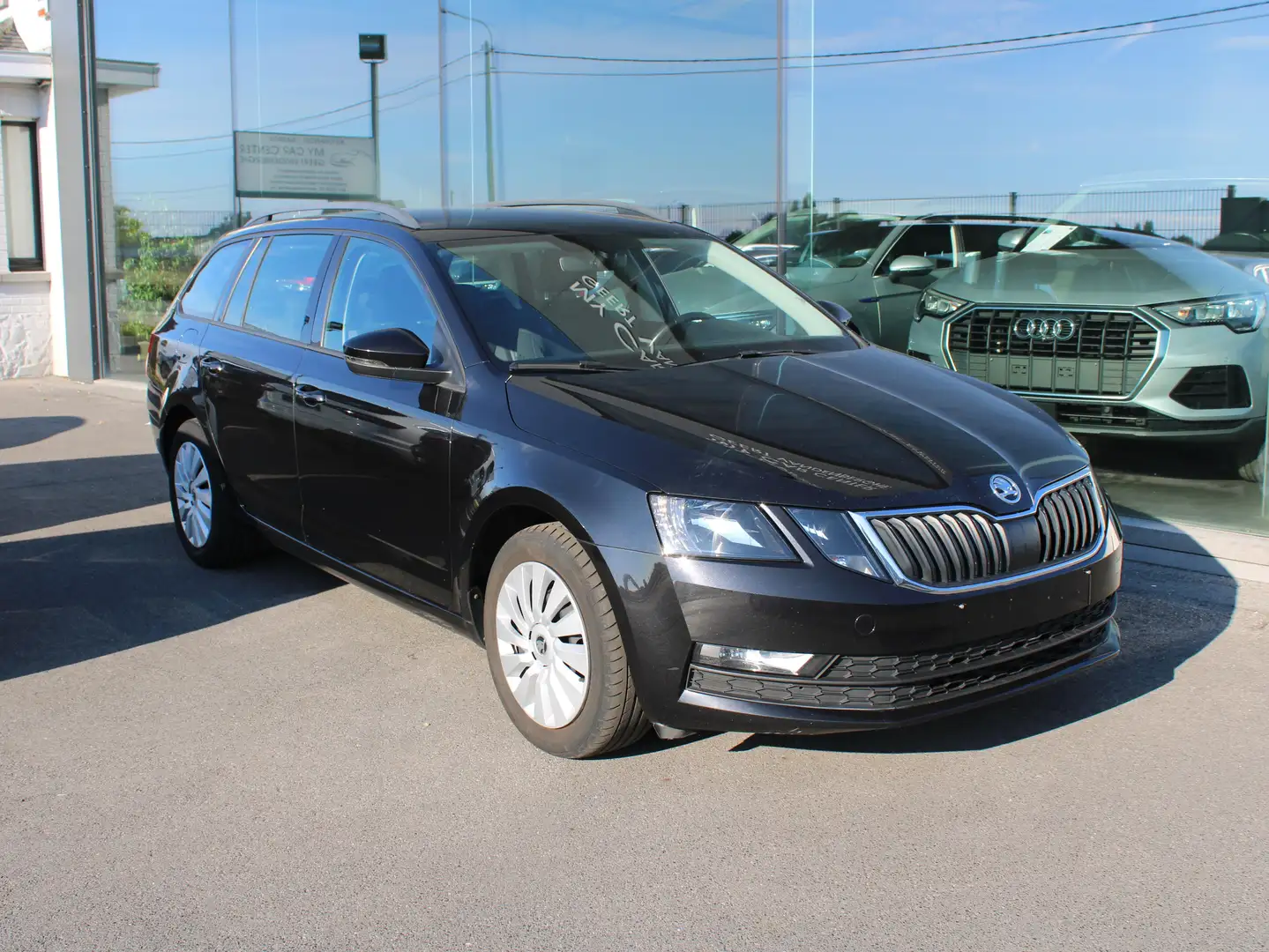 Skoda Octavia 1.0 TSI-AC-SMARTL-SPRAAKB-NAVI-6 VIT-CR CONTR-USB Zwart - 1
