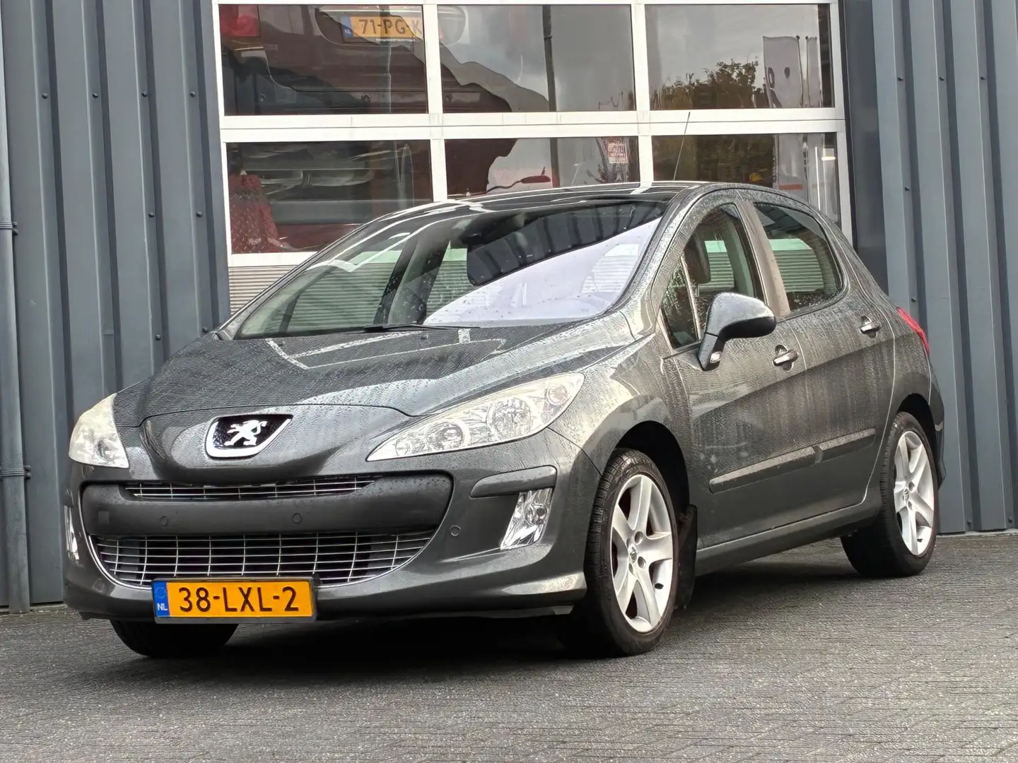 Peugeot 308 1.6 VTi Signature Clima Navigatie Cruisecontrole Grijs - 1