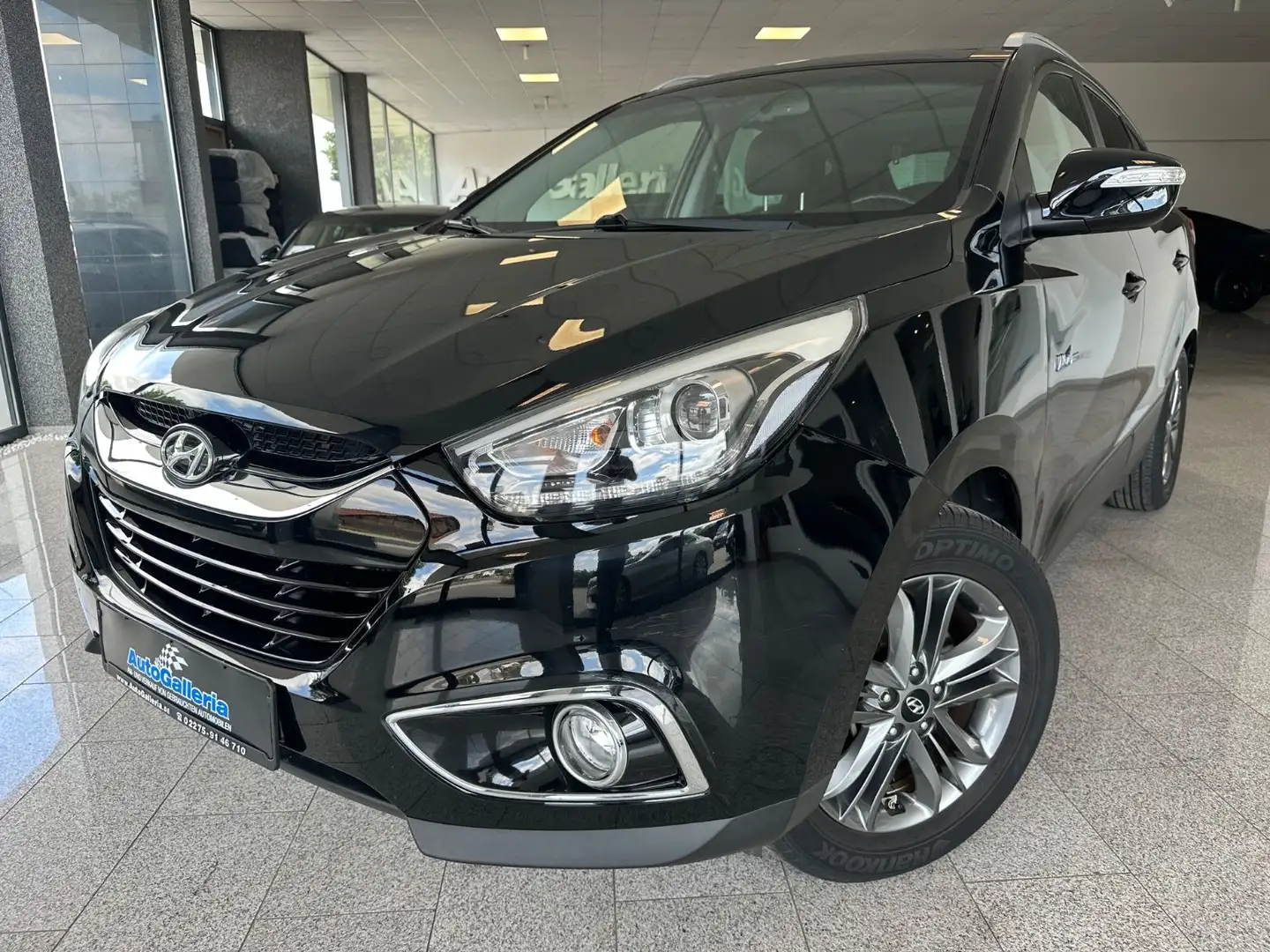 Hyundai iX35 1.7 CRDi Trend blue Pano Kamera Navi AHK Schwarz - 1