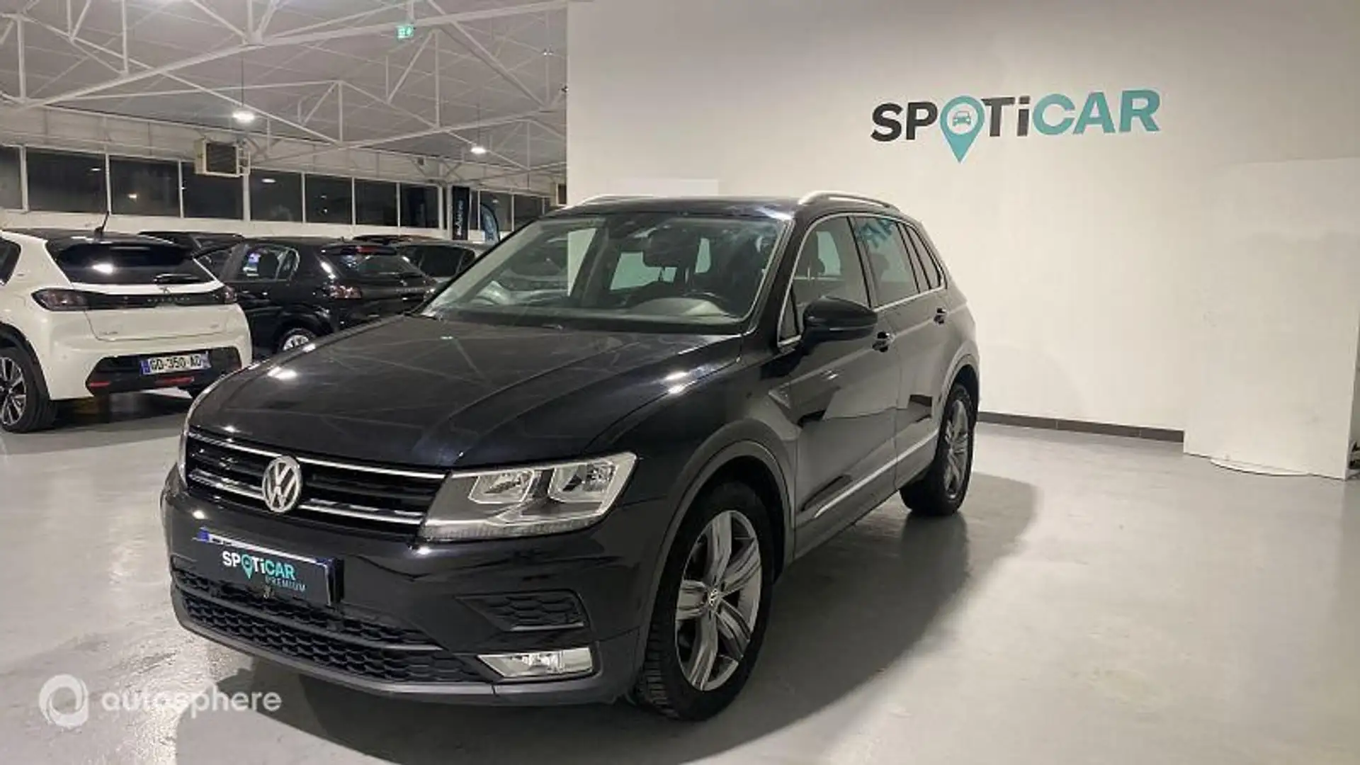 Volkswagen Tiguan 2.0 TDI 150ch BlueMotion Technology Carat Exclusiv - 1
