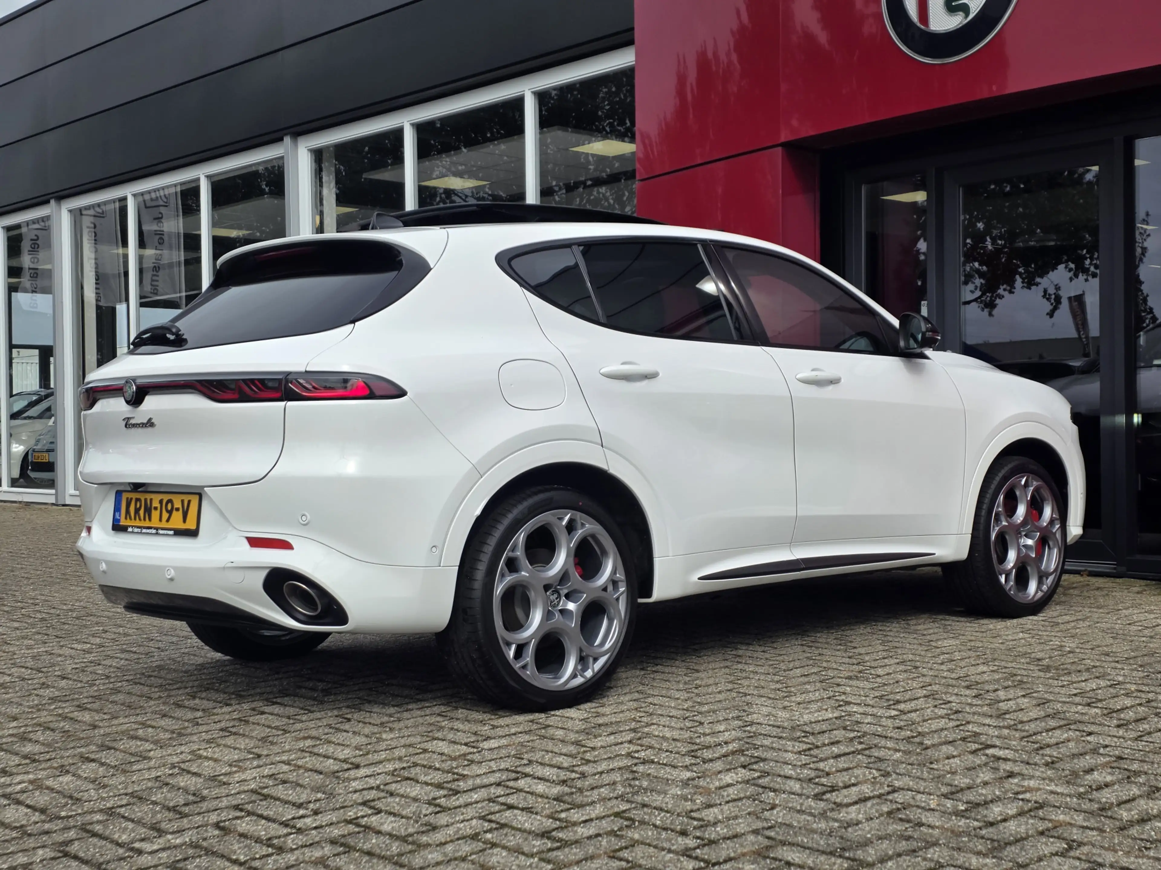 Alfa Romeo Tonale 1.3T PHEV 280PK Tributo Italiano | Panorama-dak | — photo 11