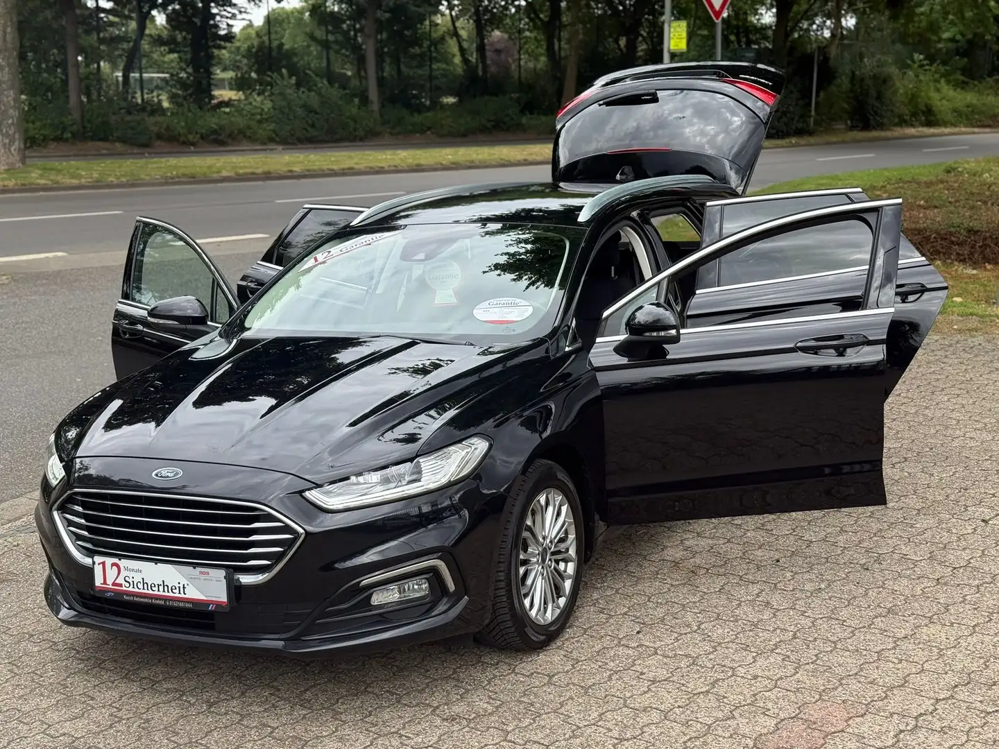 Ford Mondeo Titanium 2.0 TDCI Navi Xenon SHZ Tempo Alu 17" Schwarz - 1