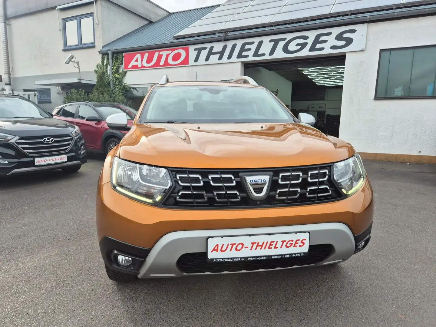 Dacia Duster 1,5 DCI, 4 WD Prestige,Navi,6 Gang Orange - 1