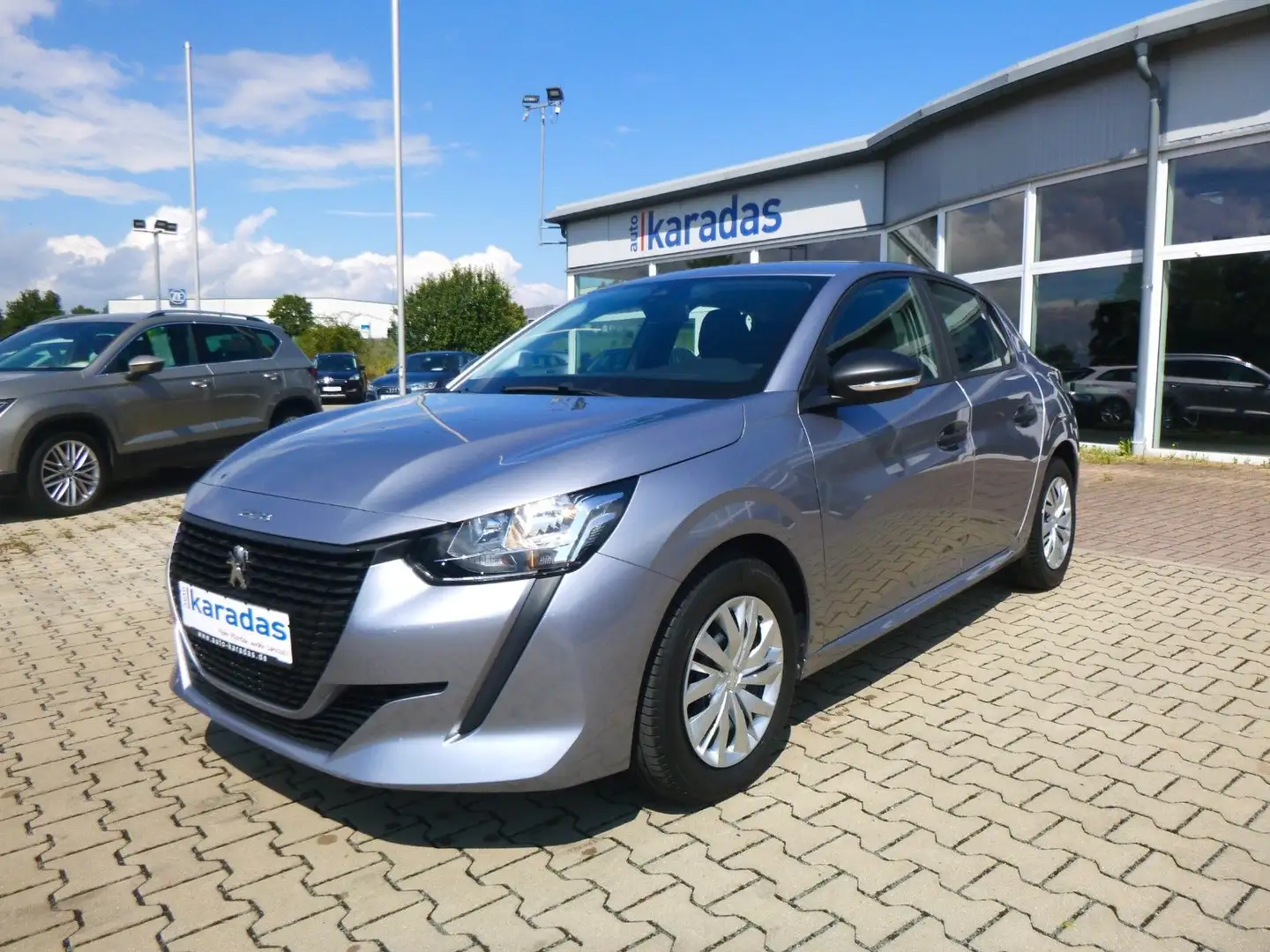 Peugeot 208 Like  8.780 KM/ Klima/TEMP/DAB-Radio Grau - 1
