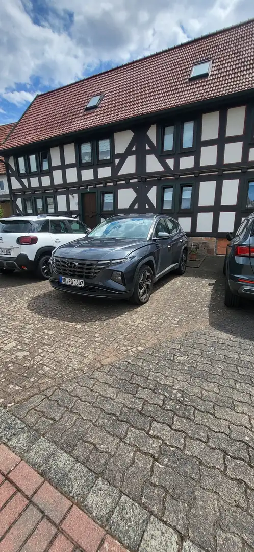 Hyundai TUCSON Basis Plug-In Hybrid 4WD Grau - 1