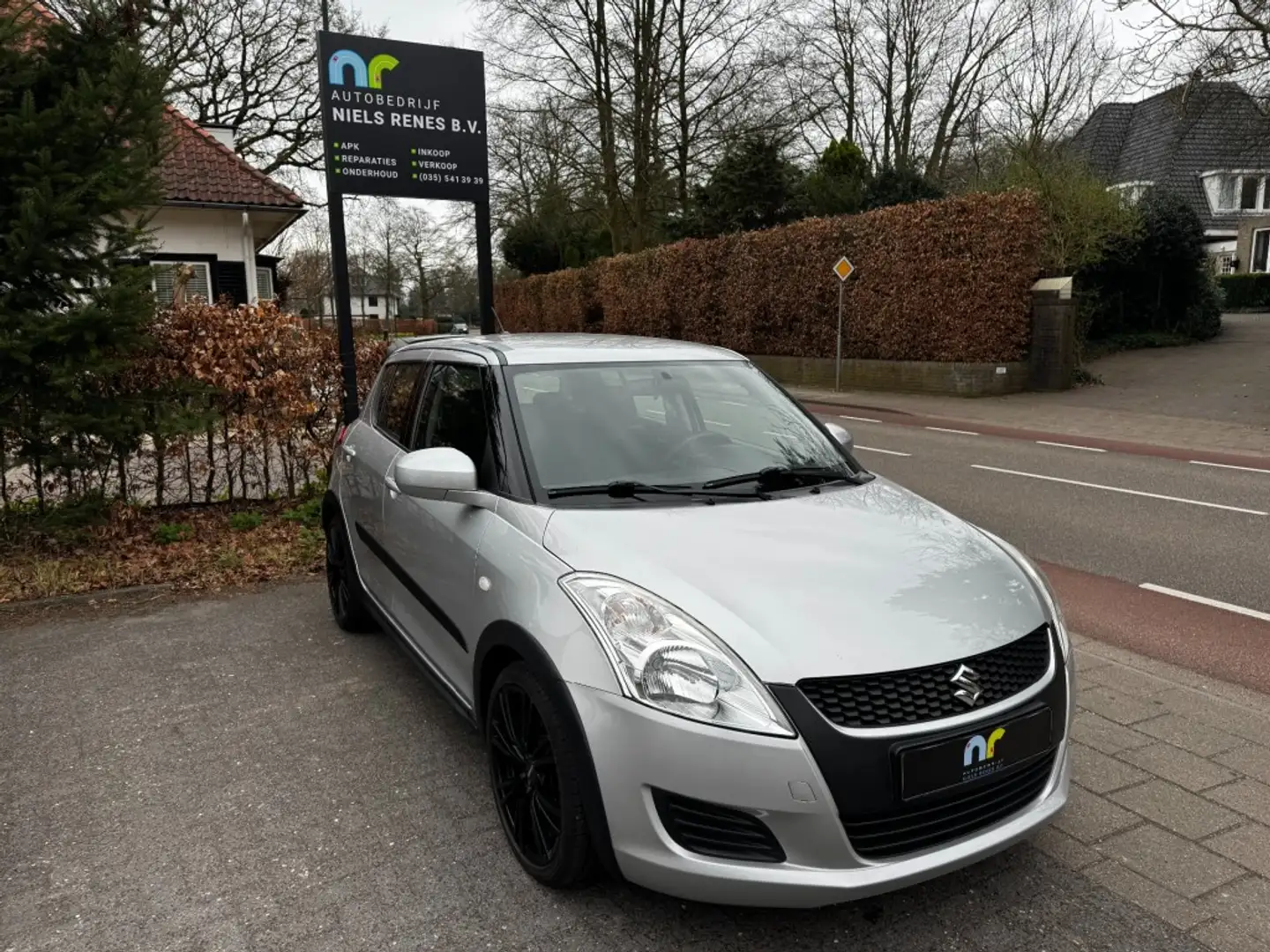 Suzuki Swift 1.2/SPORT/NAP/TREKHAAK/BLUETOOTH/AIRCO/APK/GARANTI Grijs - 1