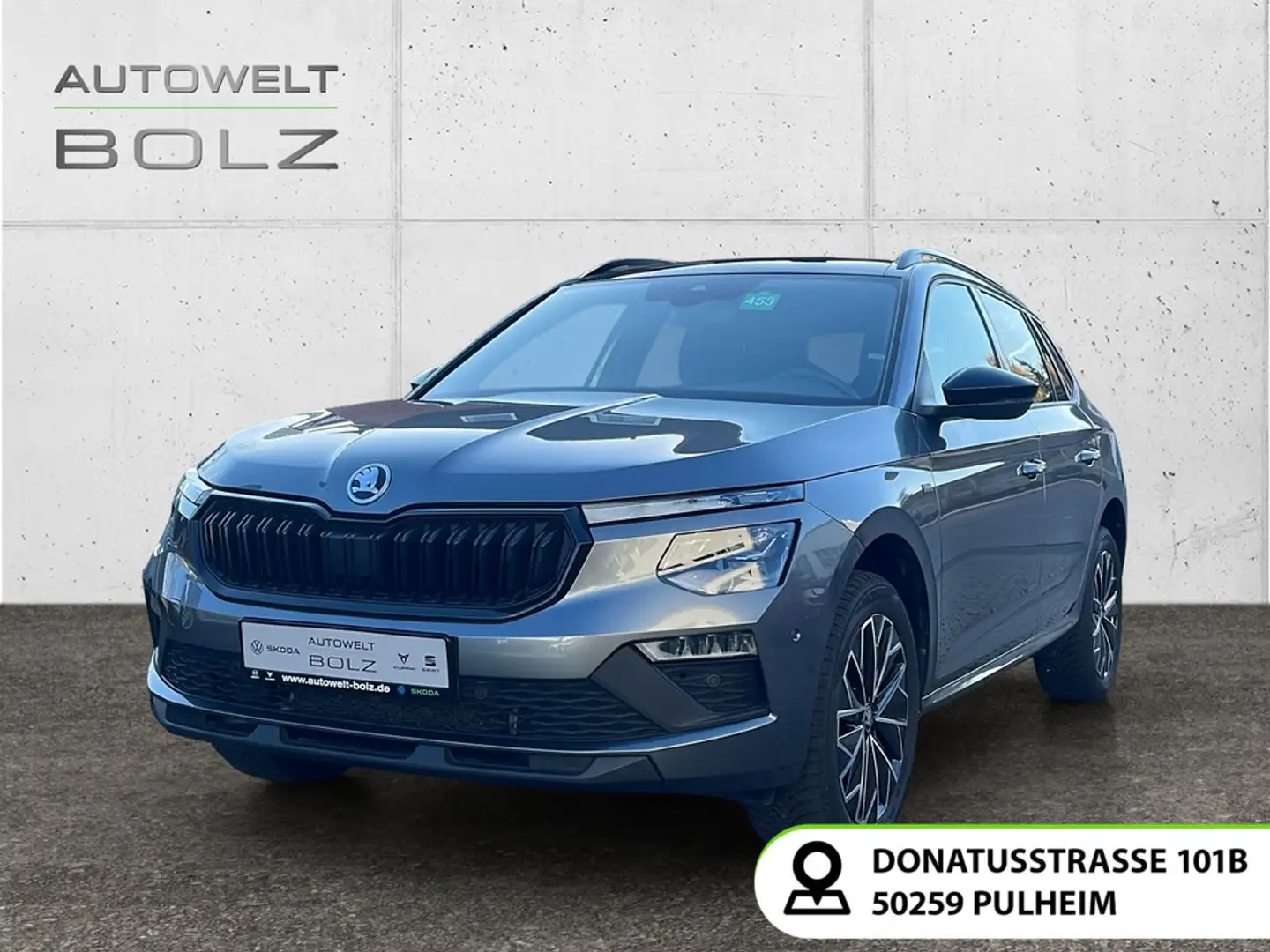 Skoda Kamiq Selection 1.5 TSI AHK Pano Navi DigiCock L Grau - 1