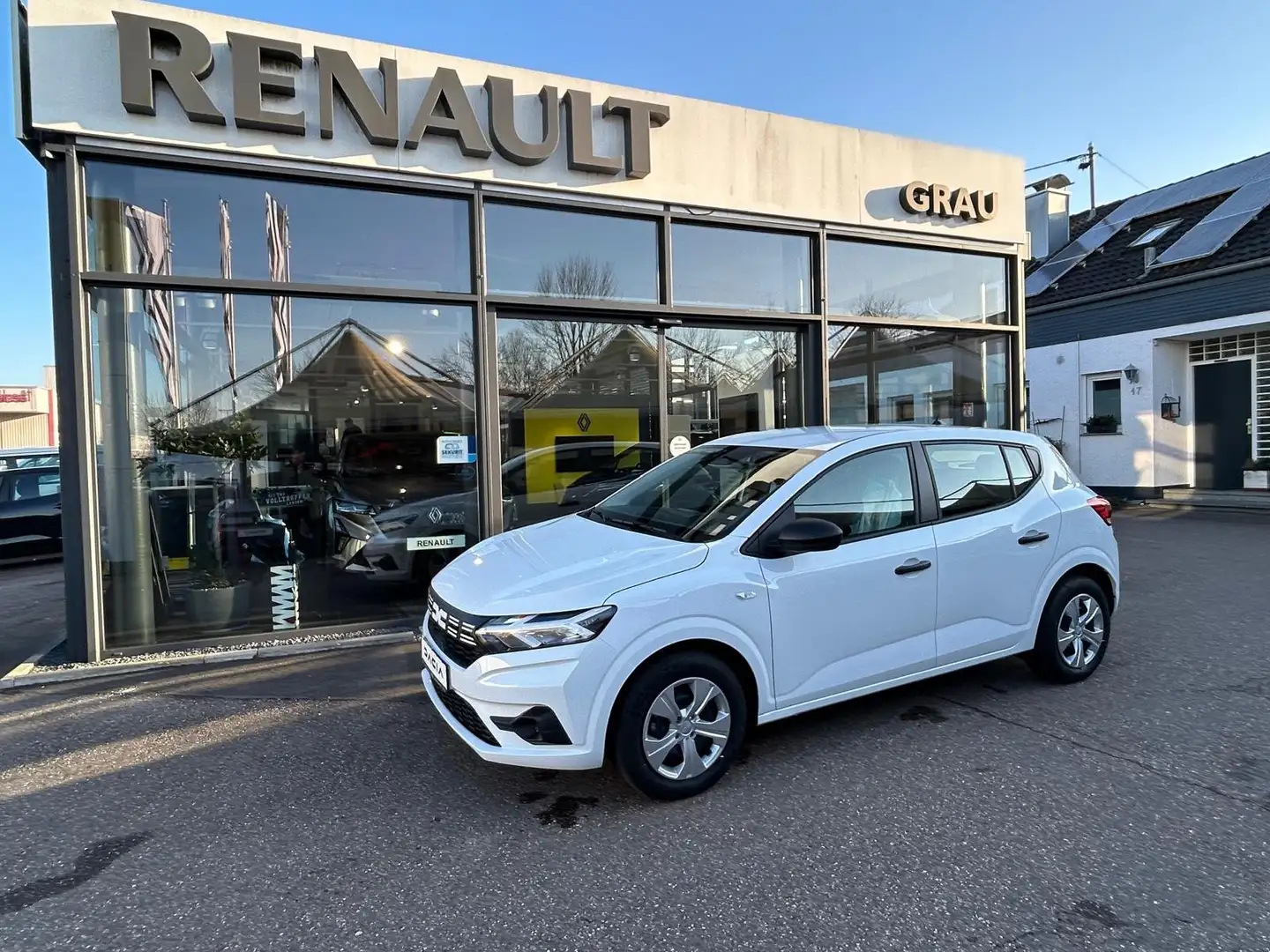 Dacia Sandero Essential  Klima / PDC Weiß - 1
