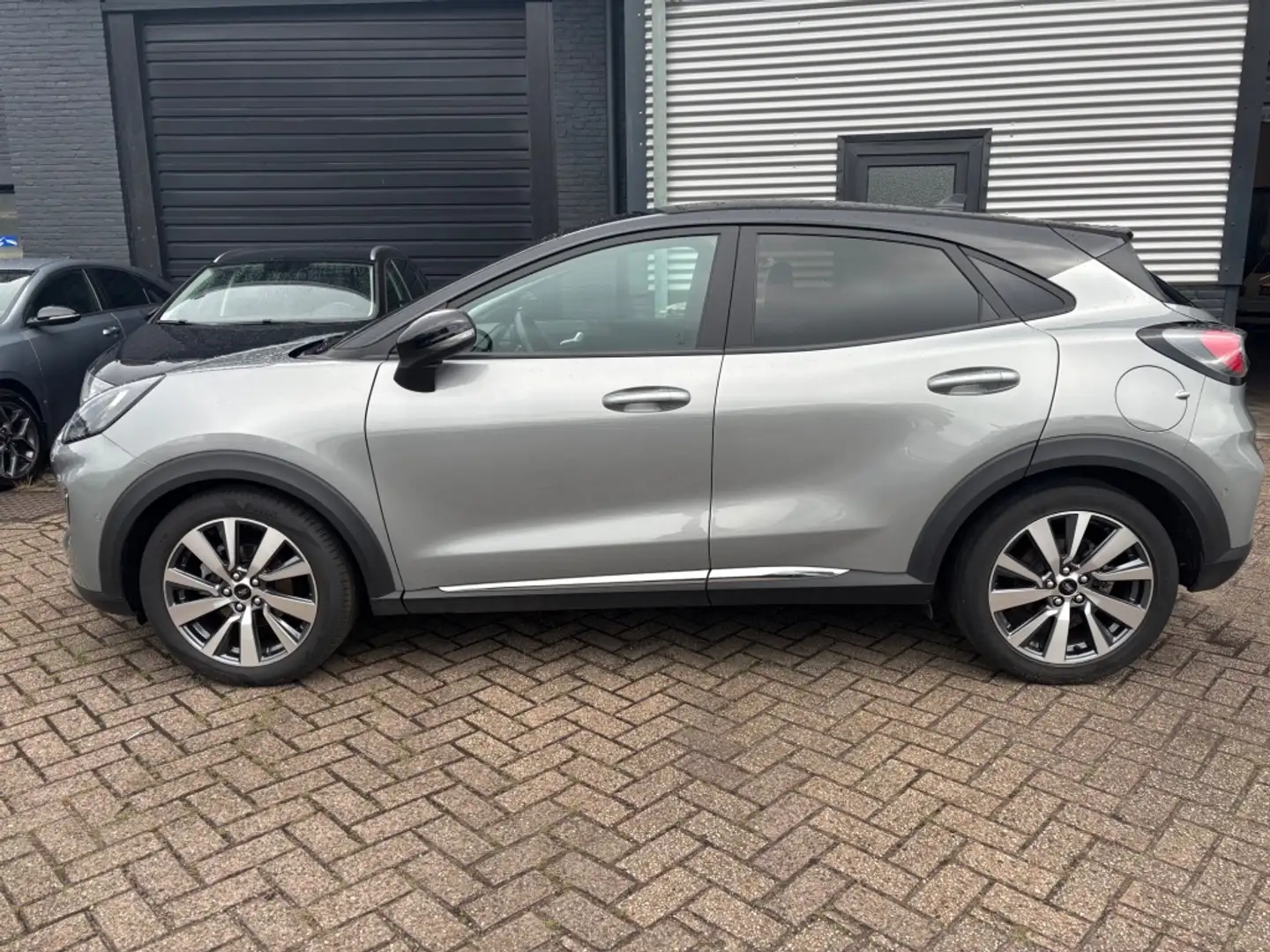Renault Captur 1.6 Plug-in Hybrid Limited | 6 MND GAR | NAVI | SP Grijs - 1