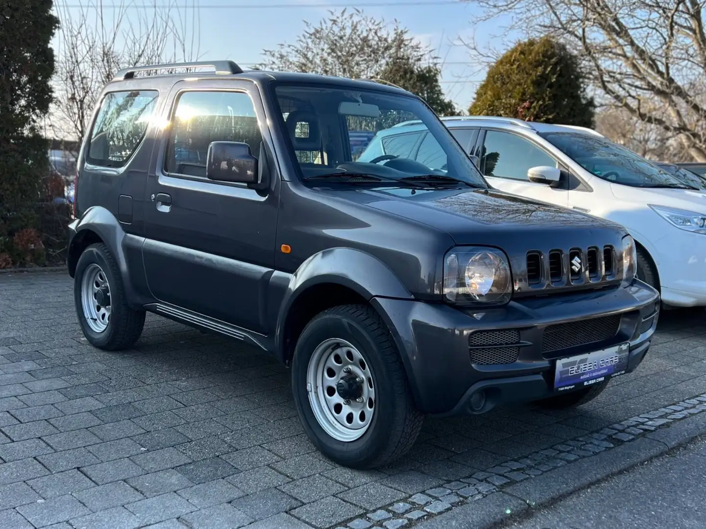 Suzuki Jimny Club Lim. *1.HAND*TÜV NEU*4x4*AHK* - 1