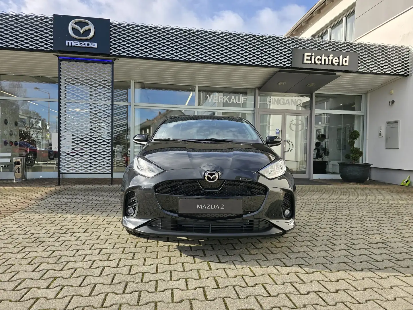Mazda 2 Hybrid 2024 HOMURA 1.5L VVT-i 116 PS e-CVT FWD Schwarz - 1