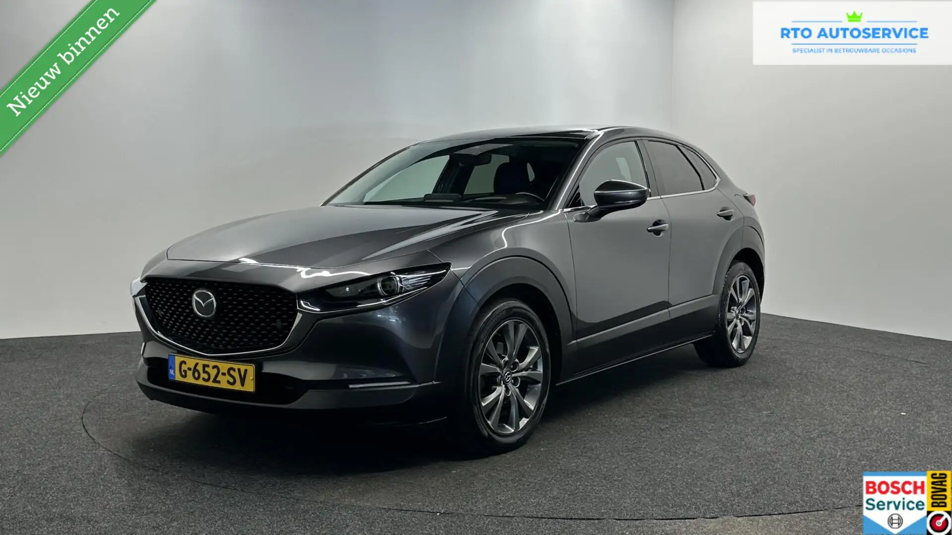 Mazda CX-30 2.0 e-SkyActiv-X M Hybrid Luxury LEER TREKHAAK NAV Gris - 1