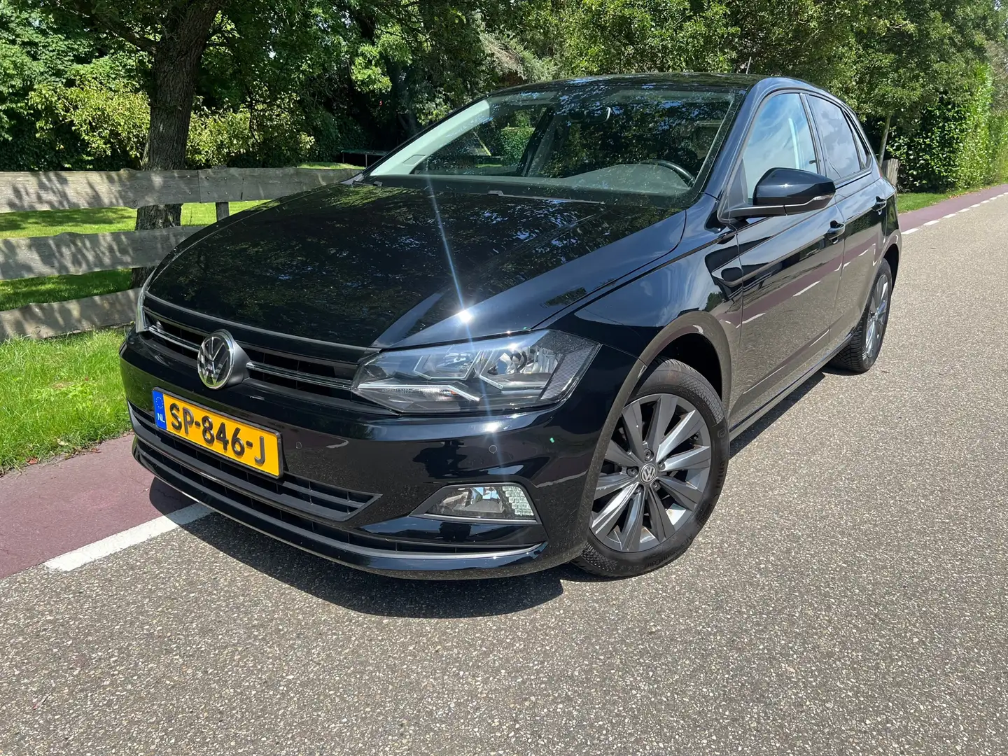 Volkswagen Polo 1.0 TSI Comfortline Business Clima Navi Zwart - 1