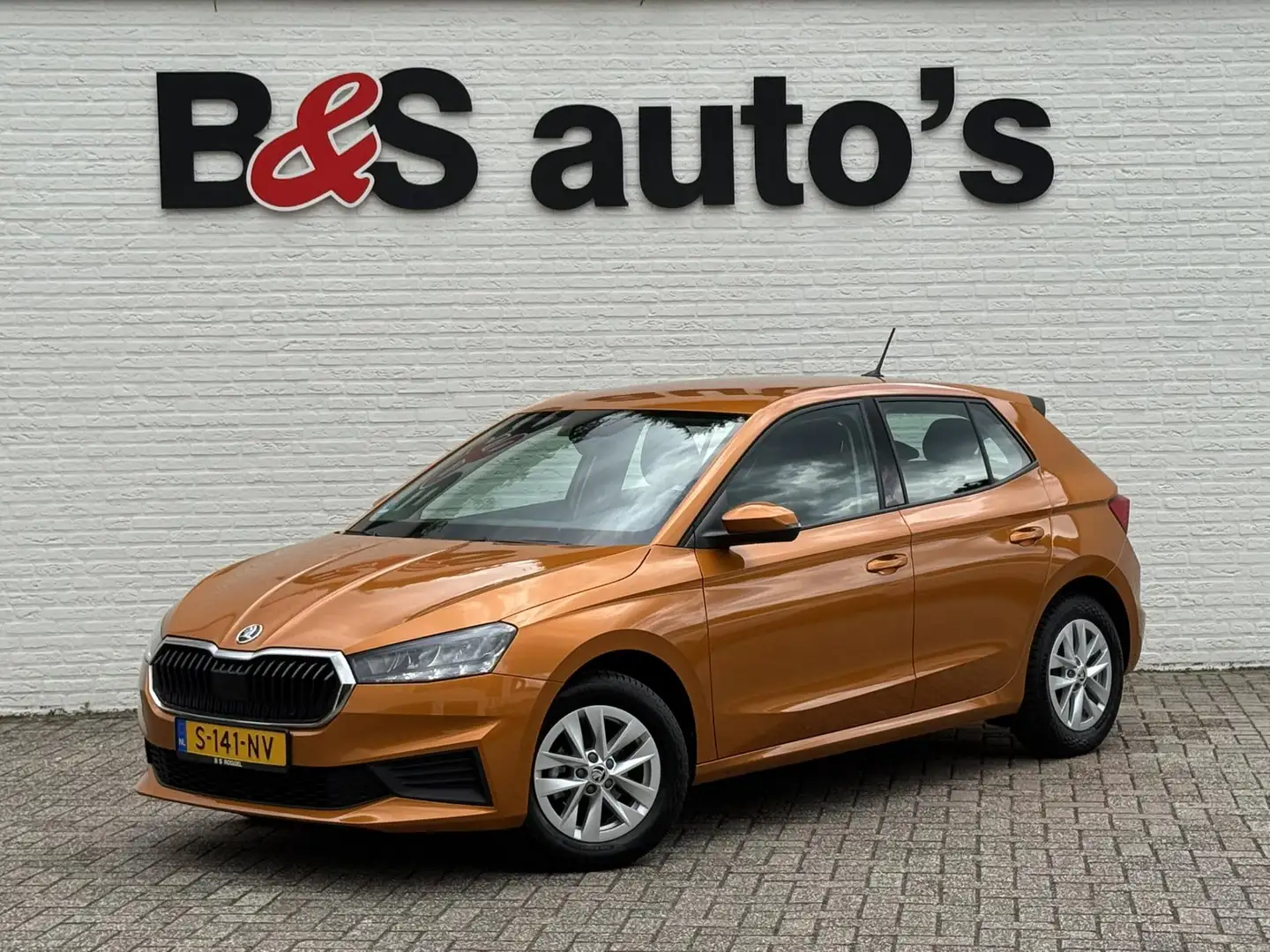 Skoda Fabia 1.0 TSI Ambition Clima Carplay Adaptive cruise Nav Oranje - 1