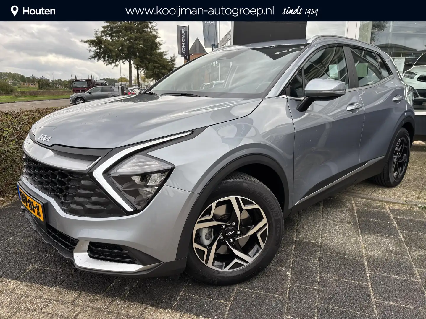Kia Sportage 1.6 T-GDi MHEV ComfortLine , Eerste eigenaar, Trek Grijs - 1