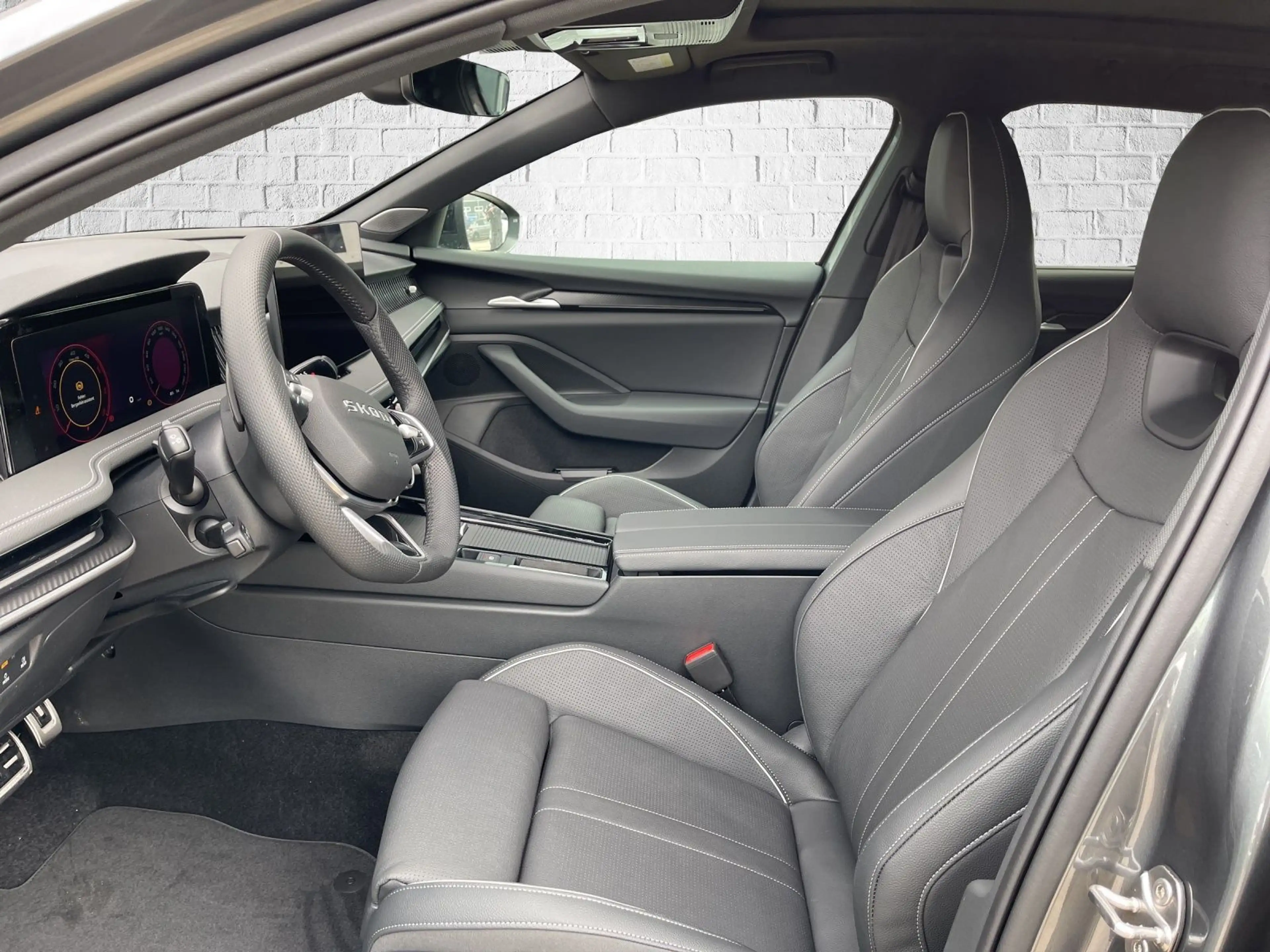 Skoda Superb Combi 2,0 TDI DSG 4x4 - Sportline — photo 9