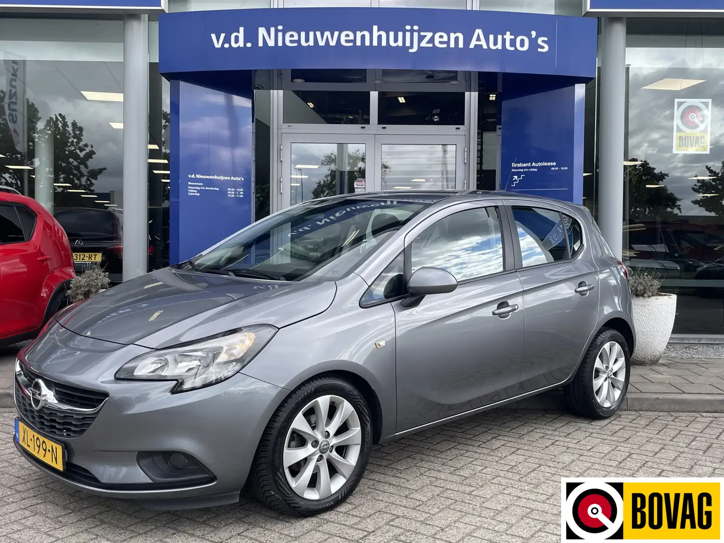 Opel Corsa 1.4 Favourite | PDC | Navi | Cruise | Gris - 1