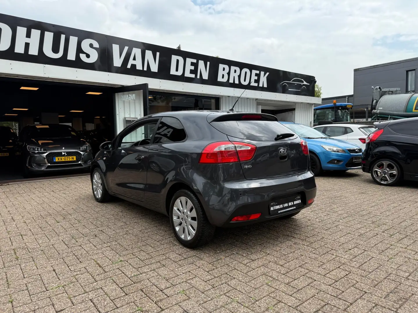 Kia Rio 1.2 CVVT Comfort Pack|Airco|Stoelverw|Pdc|Lmv|Elek Gris - 2