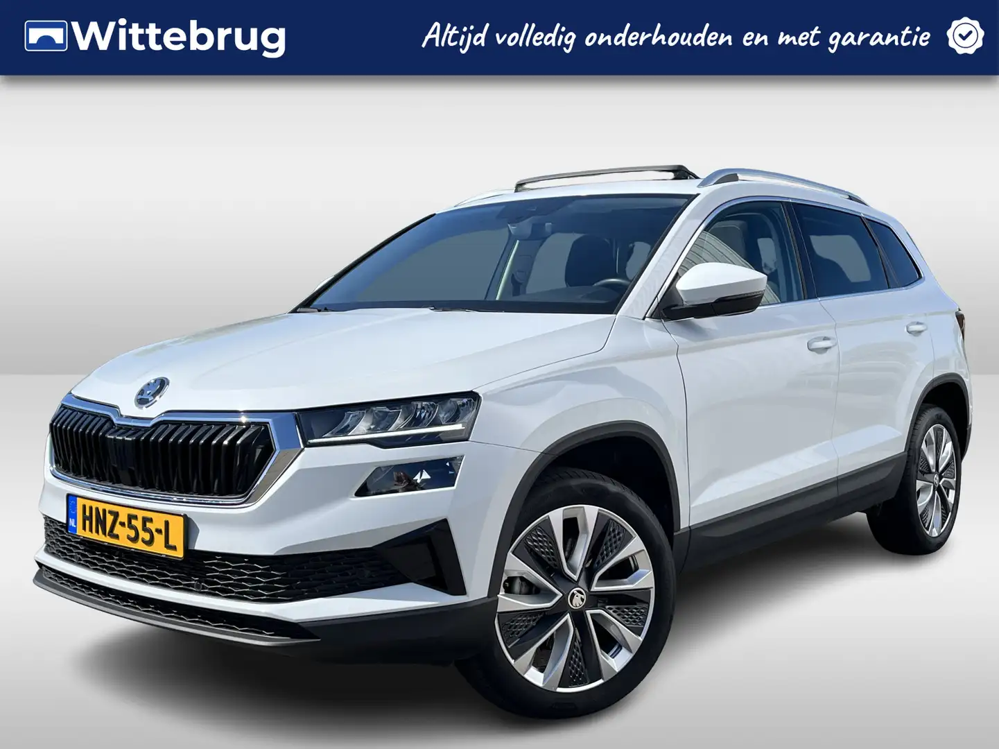 Skoda Karoq 1.5 TSI ACT Sportline Business Automaat | Panorama Wit - 1