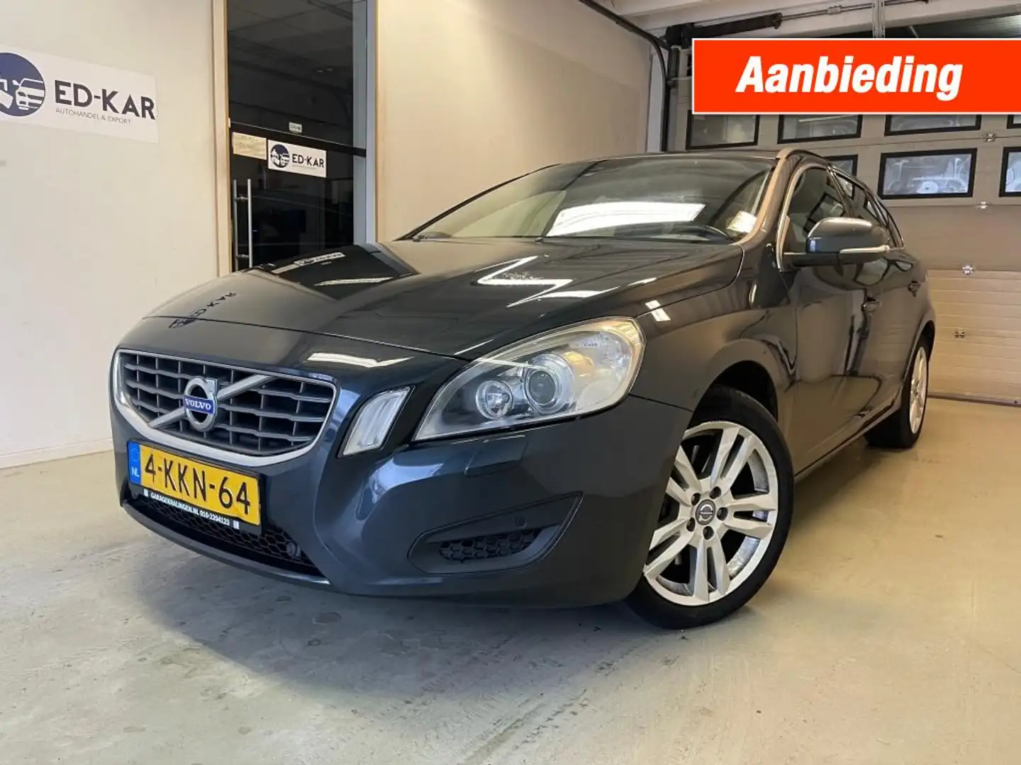 Volvo V60 2.4 D5 Summum 215 PK CLIMA NAVI XENON Grijs - 1
