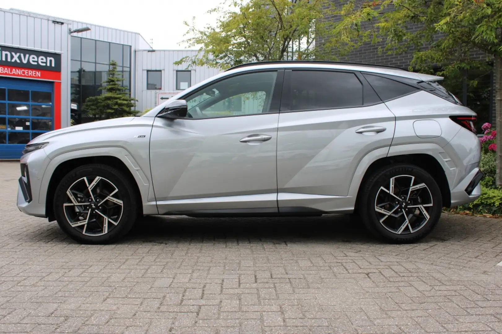 Hyundai TUCSON 1.6 T-GDI HEV N-Line Sky Full Option! + Trekhaak " Grijs - 2
